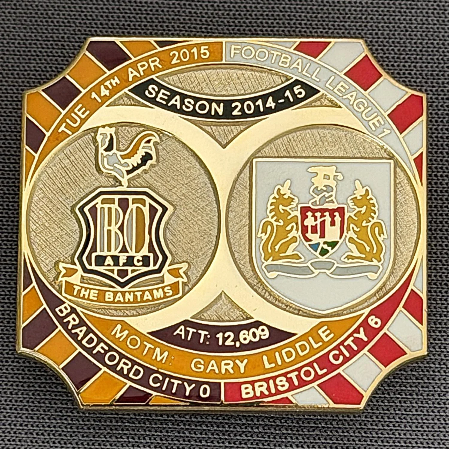 Reference Number: BCFIX275
Size: H 26.8 mm x W 28.8 mm
Pin Type: Brooch Pin
Plating: Gold
Value: £8
Manufacturer: Bradford City Badges
Comments: Bradford City v Bristol City 2014/15, Limited Edition of 50 Badges (Gold Version)