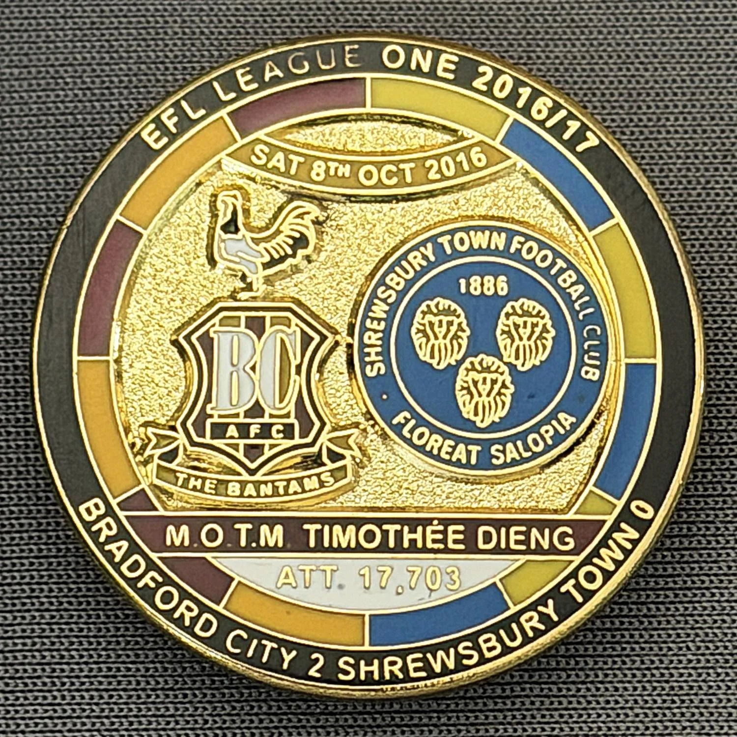 Reference Number: BCFIX374
Size: D 29.4 mm
Pin Type: Brooch Pin
Plating: Gold
Value: £8
Manufacturer: Bradford City Badges
Comments: Bradford City v Shrewsbury Town 2015/16, Limited Edition of 50 Badges (Gold Version)