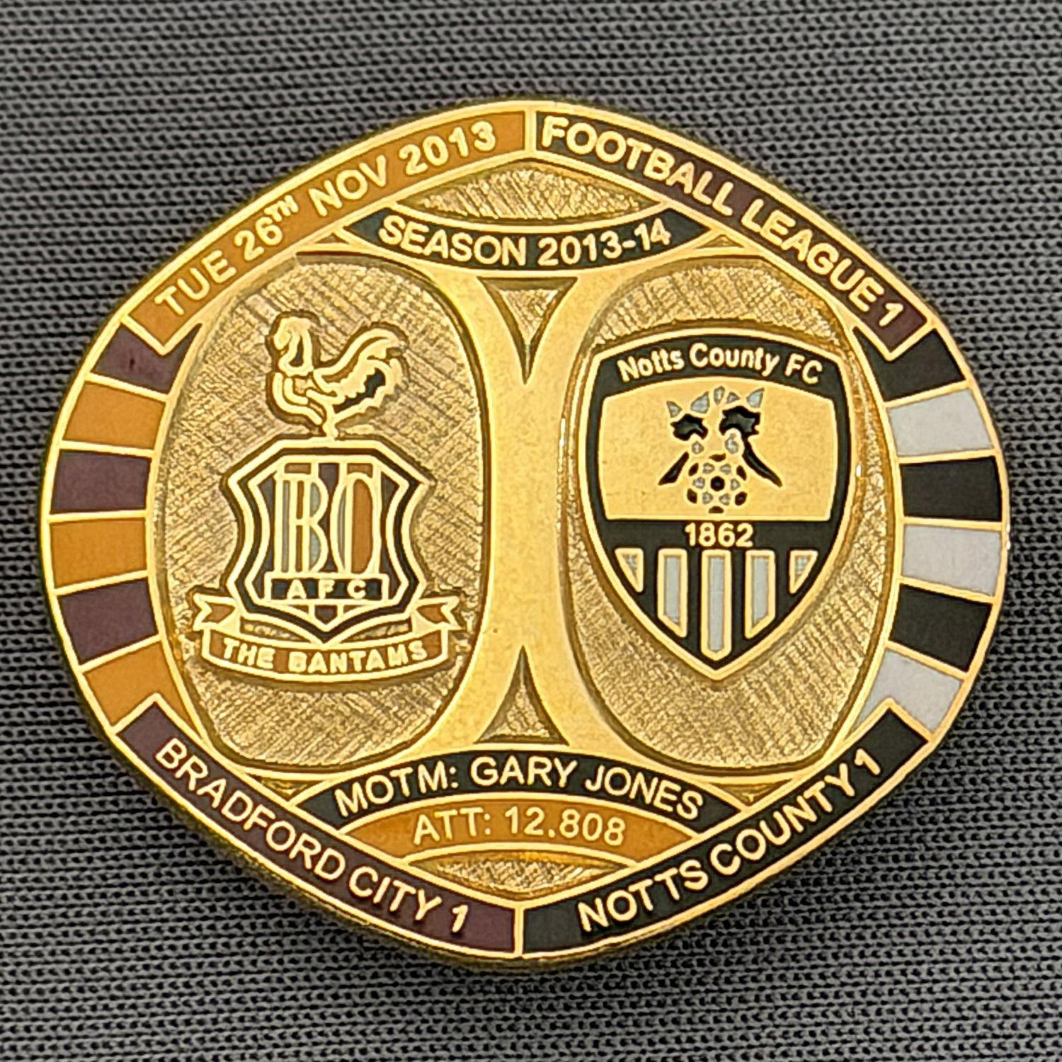 Reference Number: BCFIX193
Size: H 26.3 mm x W 28.9 mm
Pin Type: Brooch Pin
Plating: Gold
Value: £8
Manufacturer: Bradford City Badges
Comments: Bradford City v Notts County 2013/14 Limited Edition 55 Badges