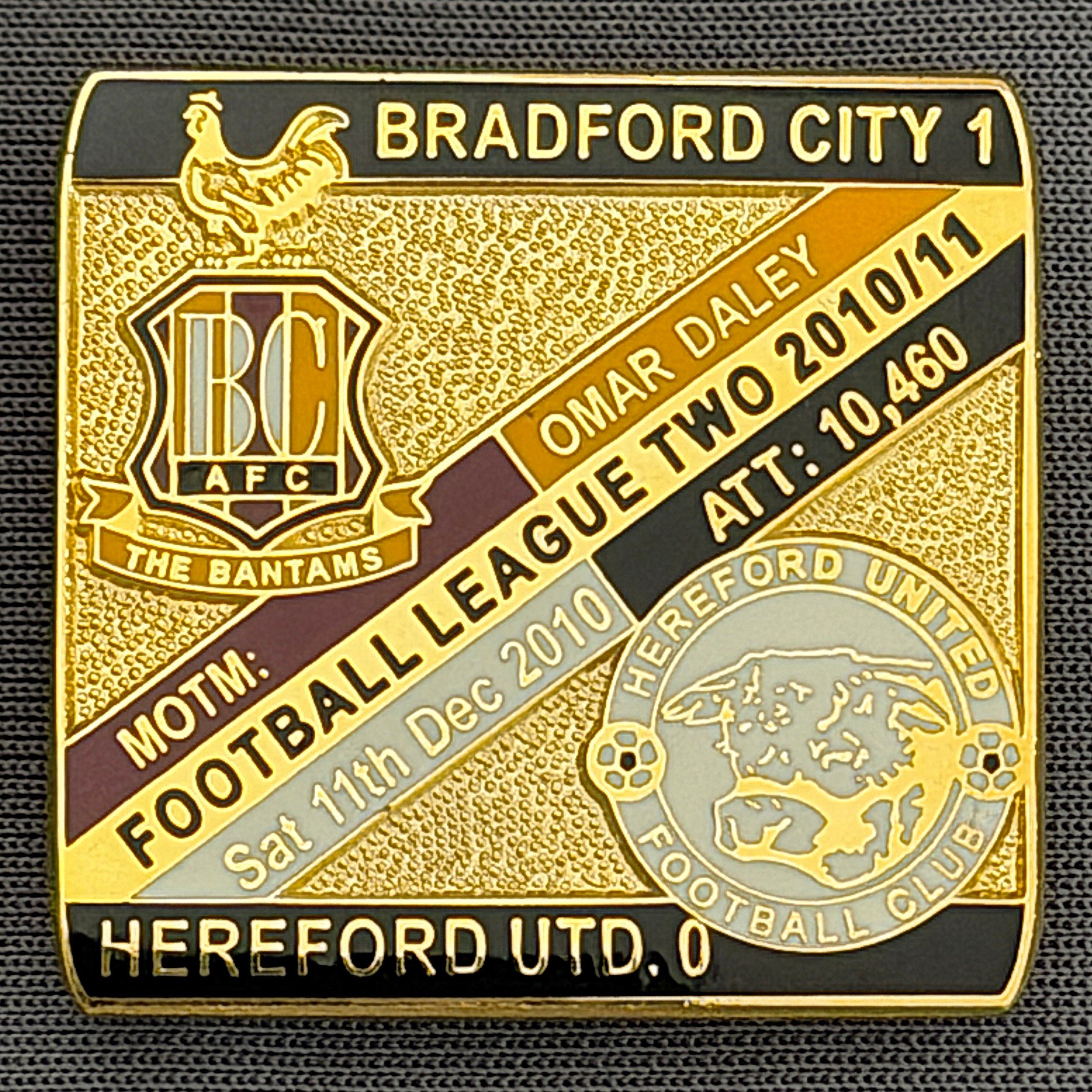 Reference Number: BCFIX056
Size: H 28.3 mm x W 29.3 mm
Pin Type: Brooch Pin
Plating: Gold
Value: £8
Manufacturer: Bradford City Badges
Comments: Bradford City v Hereford United  2010/11 Limited Edition 100 Badges
