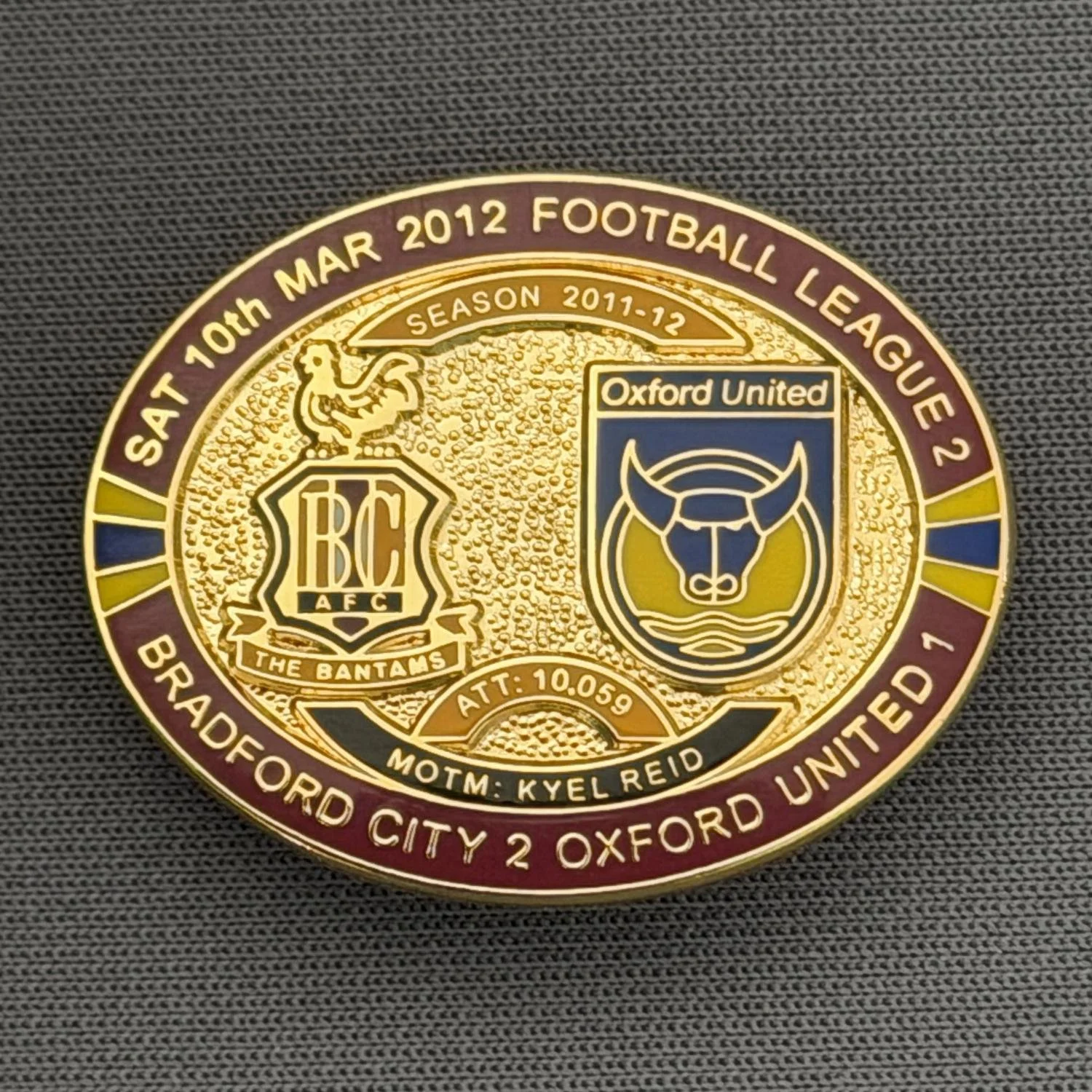 Reference Number: BCFIX087
Size: H 23.6 mm x W 28.7 mm
Pin Type: Brooch Pin
Plating: Gold
Value: £8
Manufacturer: Bradford City Badges
Comments: Bradford City v Oxford United  2011/12 Limited Edition 80 Badges