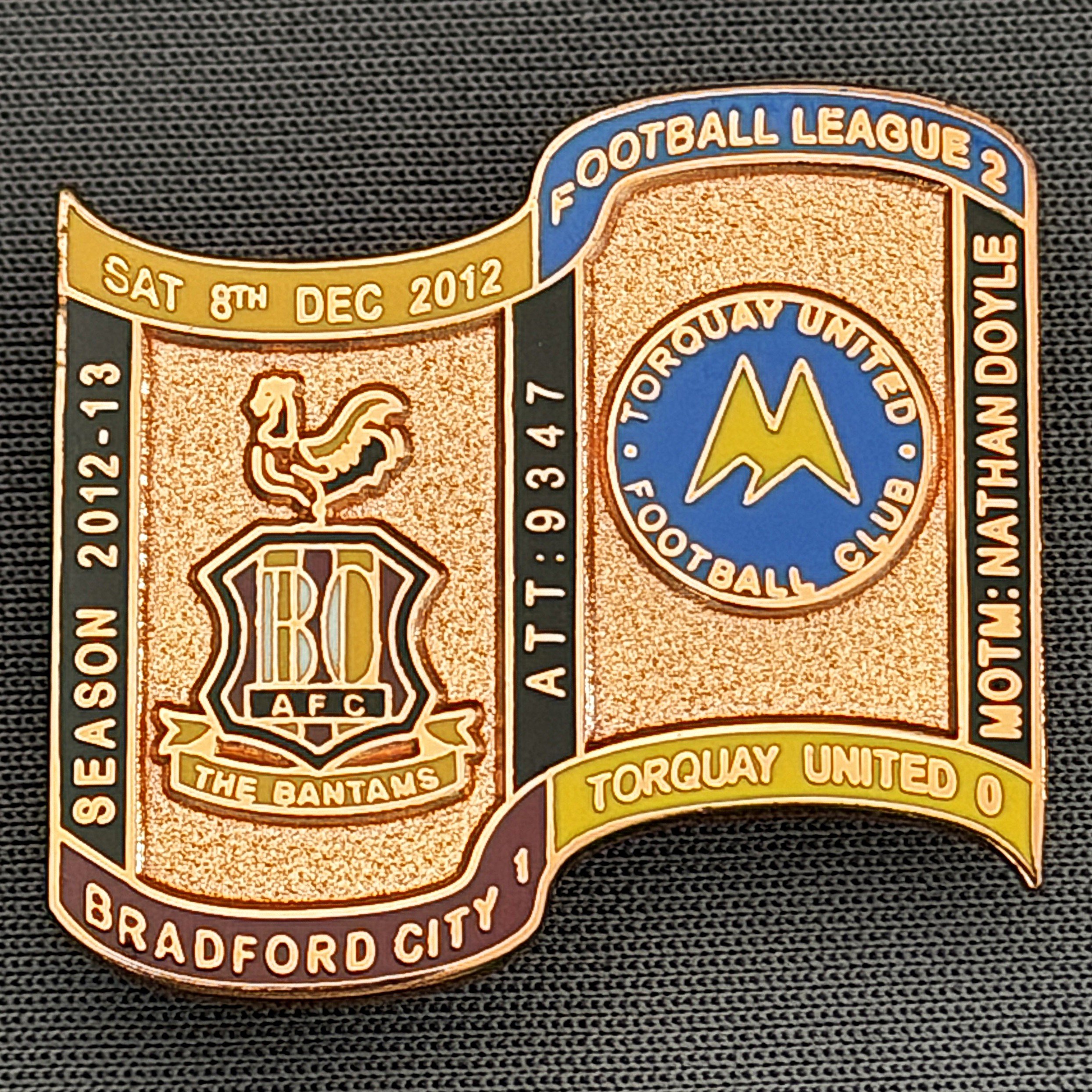 Reference Number: BCFIX172
Size: H 26.9 mm x W 29.2 mm
Pin Type: Brooch Pin
Plating: Copper
Value: £12
Manufacturer: Bradford City Badges
Comments: Bradford City v Torquay United  2012/13 Limited Edition 1 Badge (Copper Version)