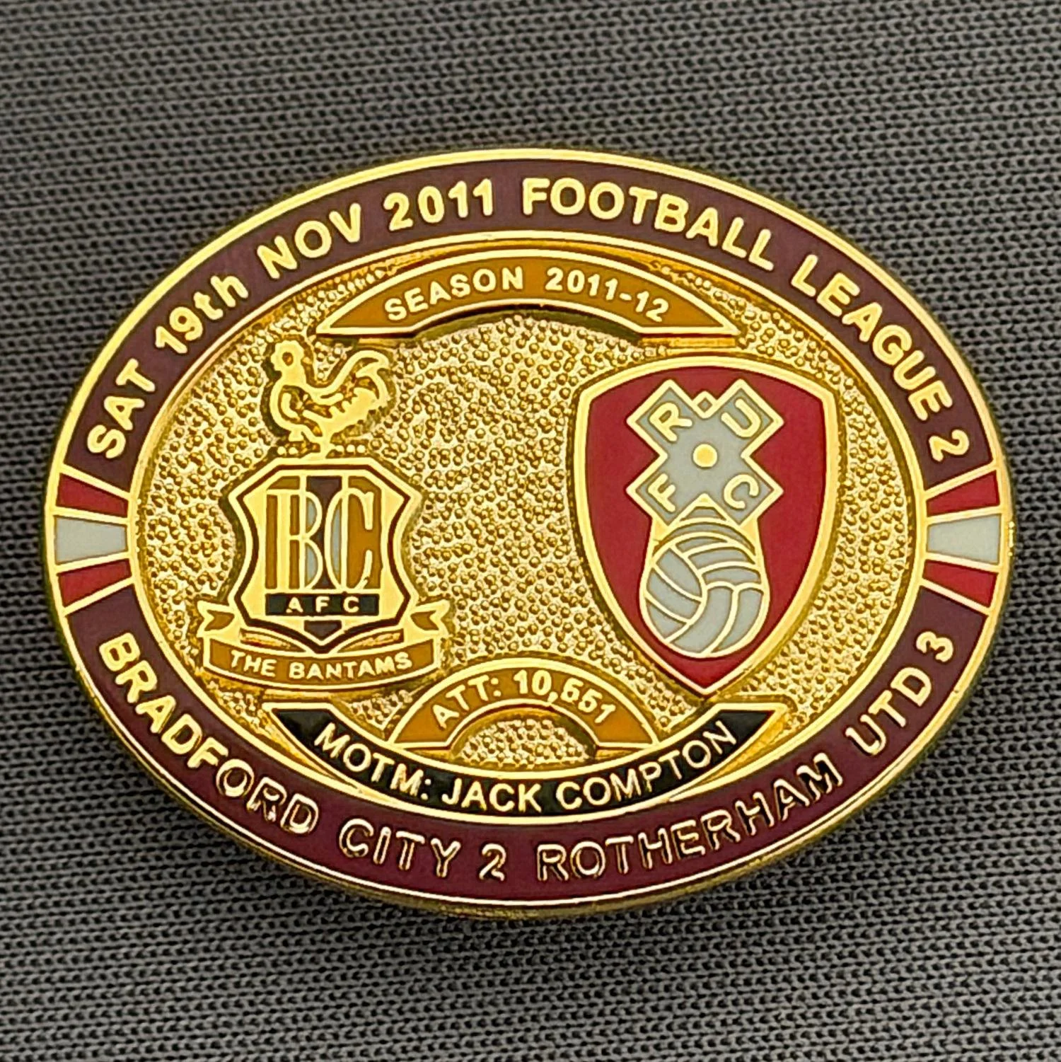Reference Number: BCFIX078
Size: H 23.6 mm x W 28.7 mm
Pin Type: Brooch Pin
Plating: Gold
Value: £8
Manufacturer: Bradford City Badges
Comments: Bradford City v Rotherham United 2011/12 Limited Edition 80 Badges