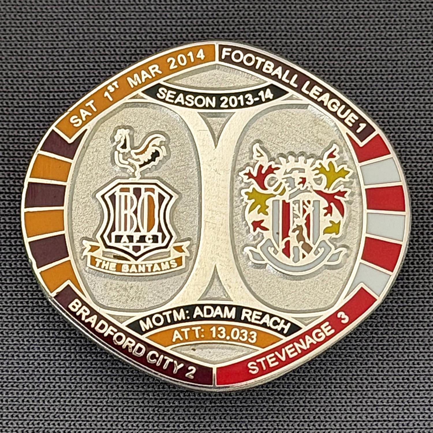 Reference Number: BCFIX225
Size: H 26.3 mm x W 28.9 mm
Pin Type: Brooch Pin
Plating: Silver
Value: £10
Manufacturer: Bradford City Badges
Comments: Bradford City v Stevenage 2013/14 Limited Edition 10 Badges (Silver Version)
