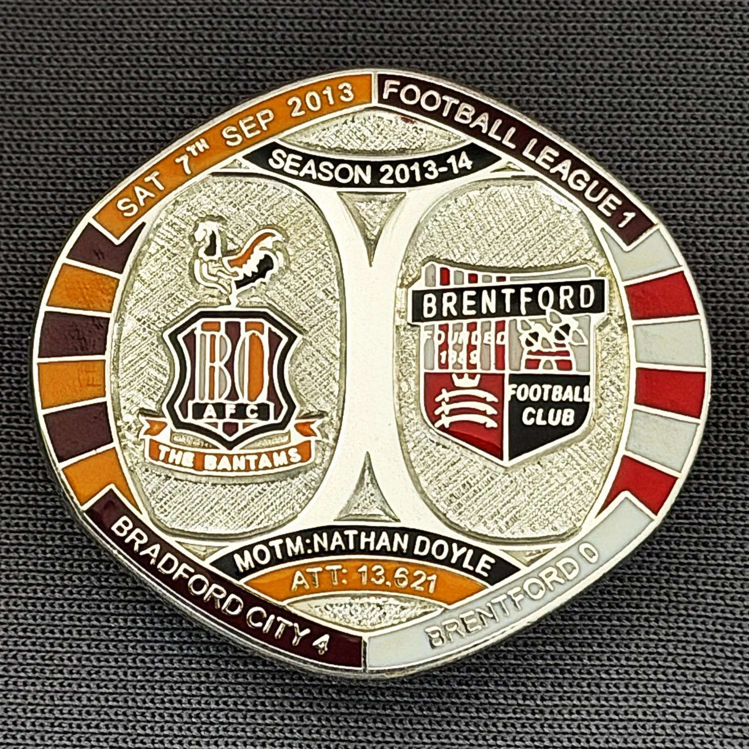 Reference Number: BCFIX210
Size: H 26.3 mm x W 28.9 mm
Pin Type: Brooch Pin
Plating: Silver
Value: £10
Manufacturer: Bradford City Badges
Comments: Bradford City v Brentford  2013/14 Limited Edition 10 Badges (Silver Version)