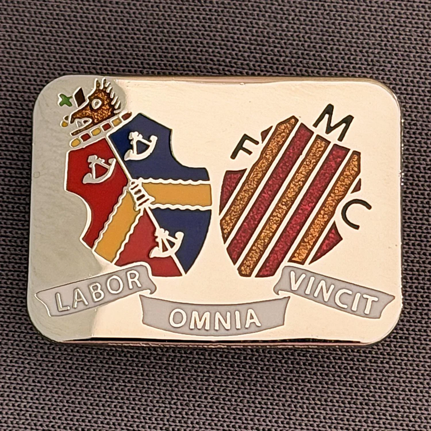 Reference Number: BCC&L054
Size: H 18.5 mm x 25 mm
Pin Type: Brooch Pin
Plating: Silver
Value: £8
Manufacturer: Paraders
Comments:  Central Part of Coat of Arms with Manningham FC Shield