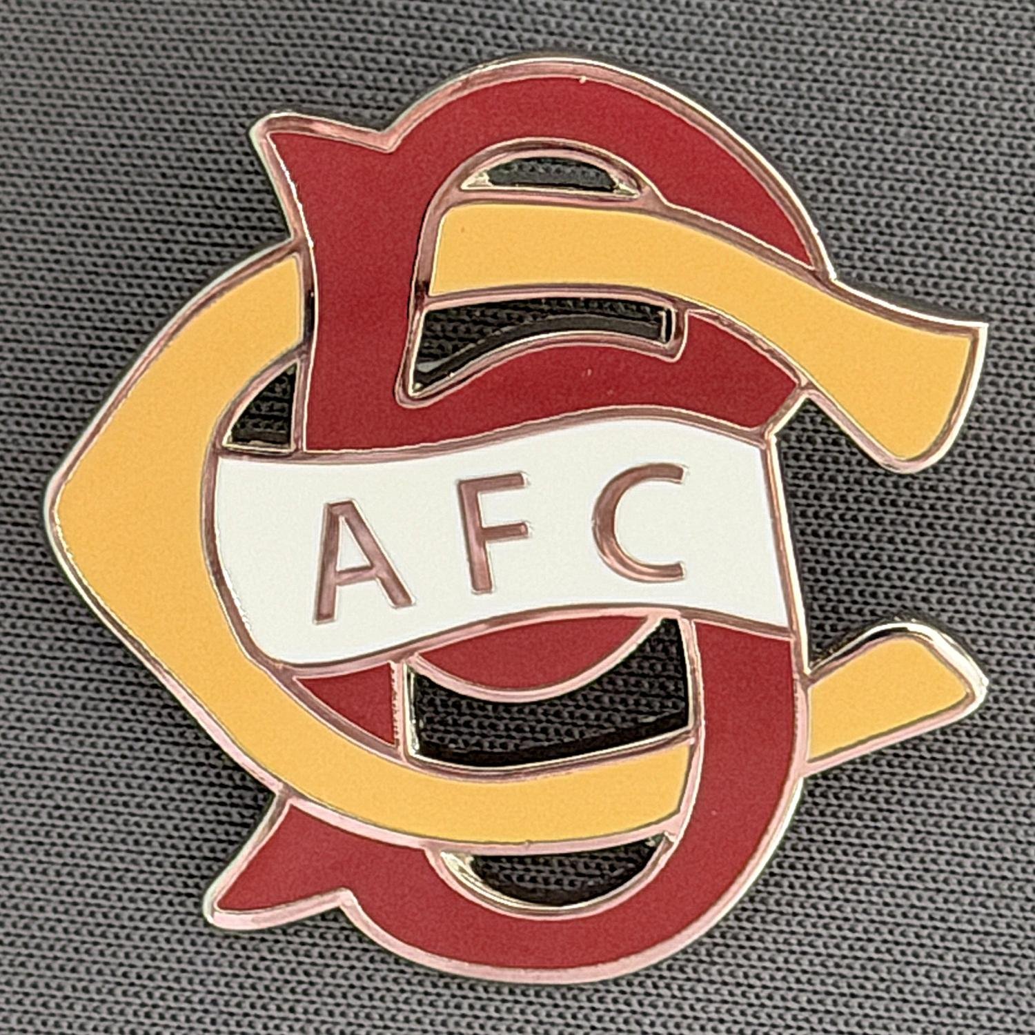 Reference Number: BCC&L061
Size: H 30 mm x 30 mm
Pin Type: Brooch Pin
Plating: Silver
Value: £8
Manufacturer: Paraders
Comments: BCAFC Ayrton Scroll Claret & Amber, White