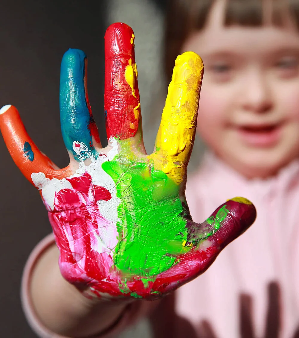 Child playing with paint