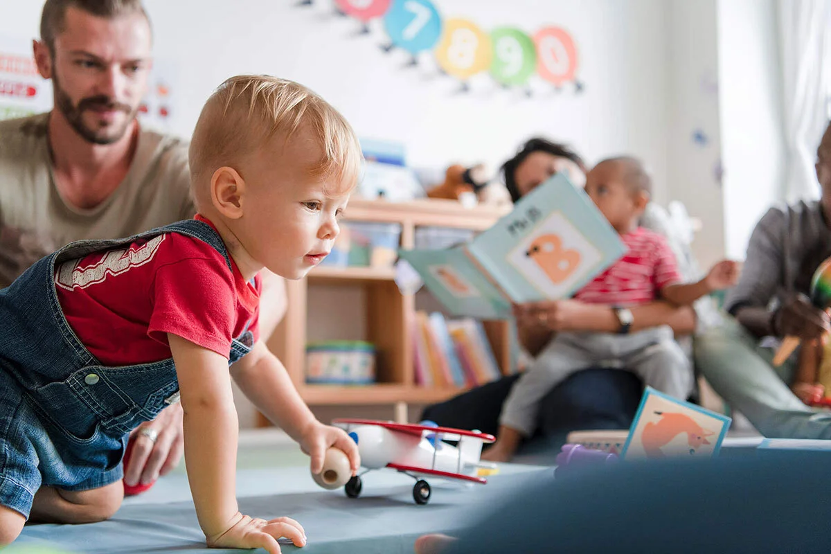 Family playing at kids centre