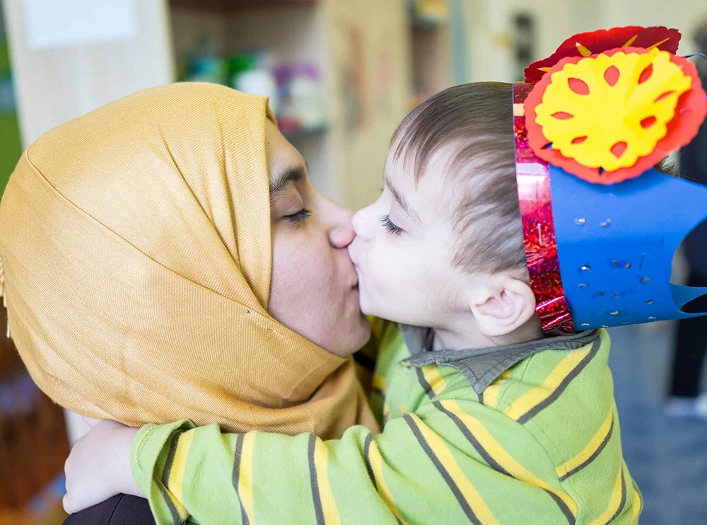 mother-kissing-son.jpg