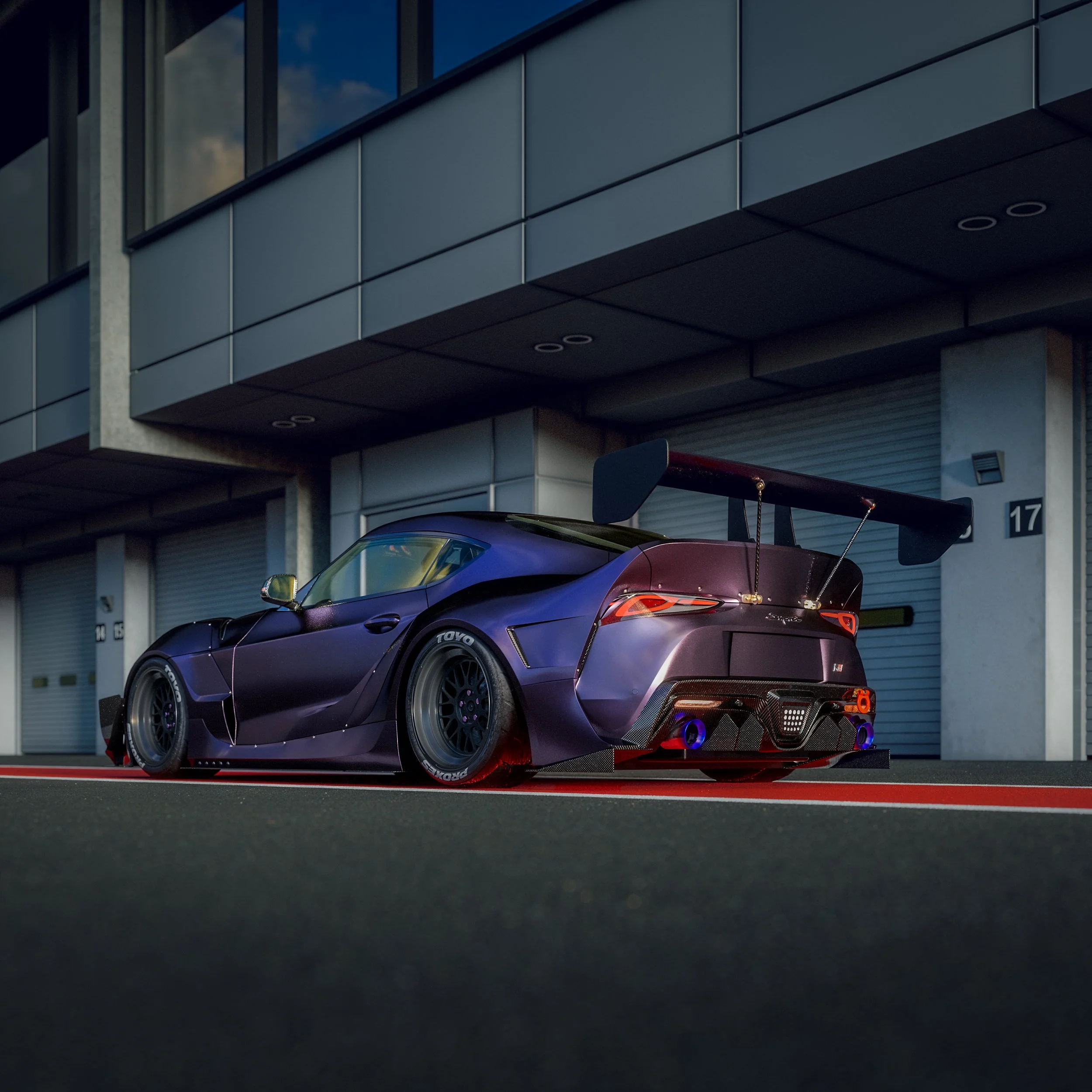 A dark purple sports car with a large rear wing, low profile, and racing tires parked outside a modern building at dusk.