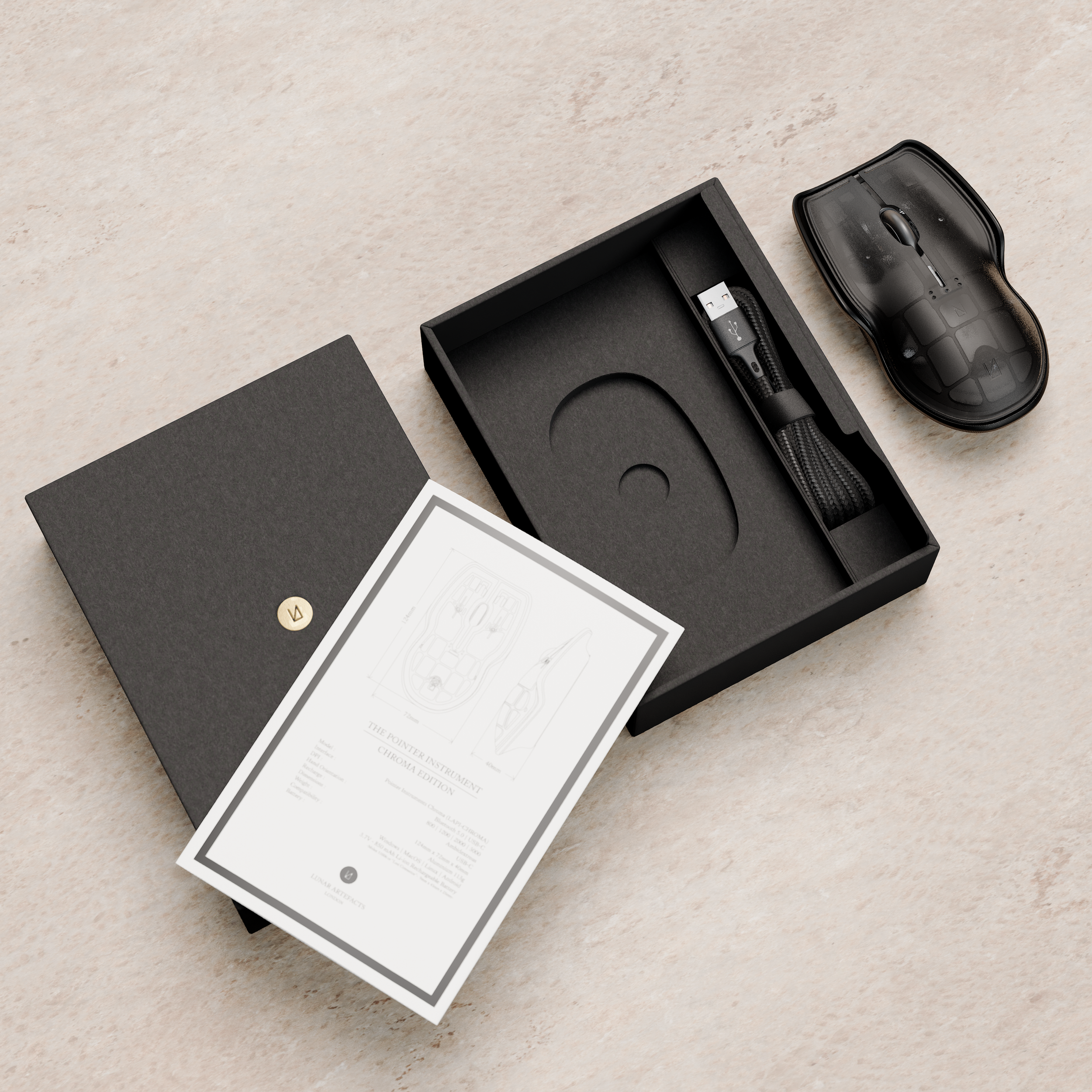 Open black box with a booklet and a coiled black and gray cable inside, along with a black ergonomic computer mouse.