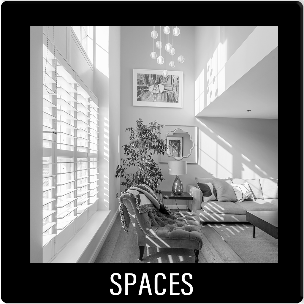 SPACES. Interior architectural visualisation. Sun-drenched living room rendering focusing on natural light and interior design atmosphere.