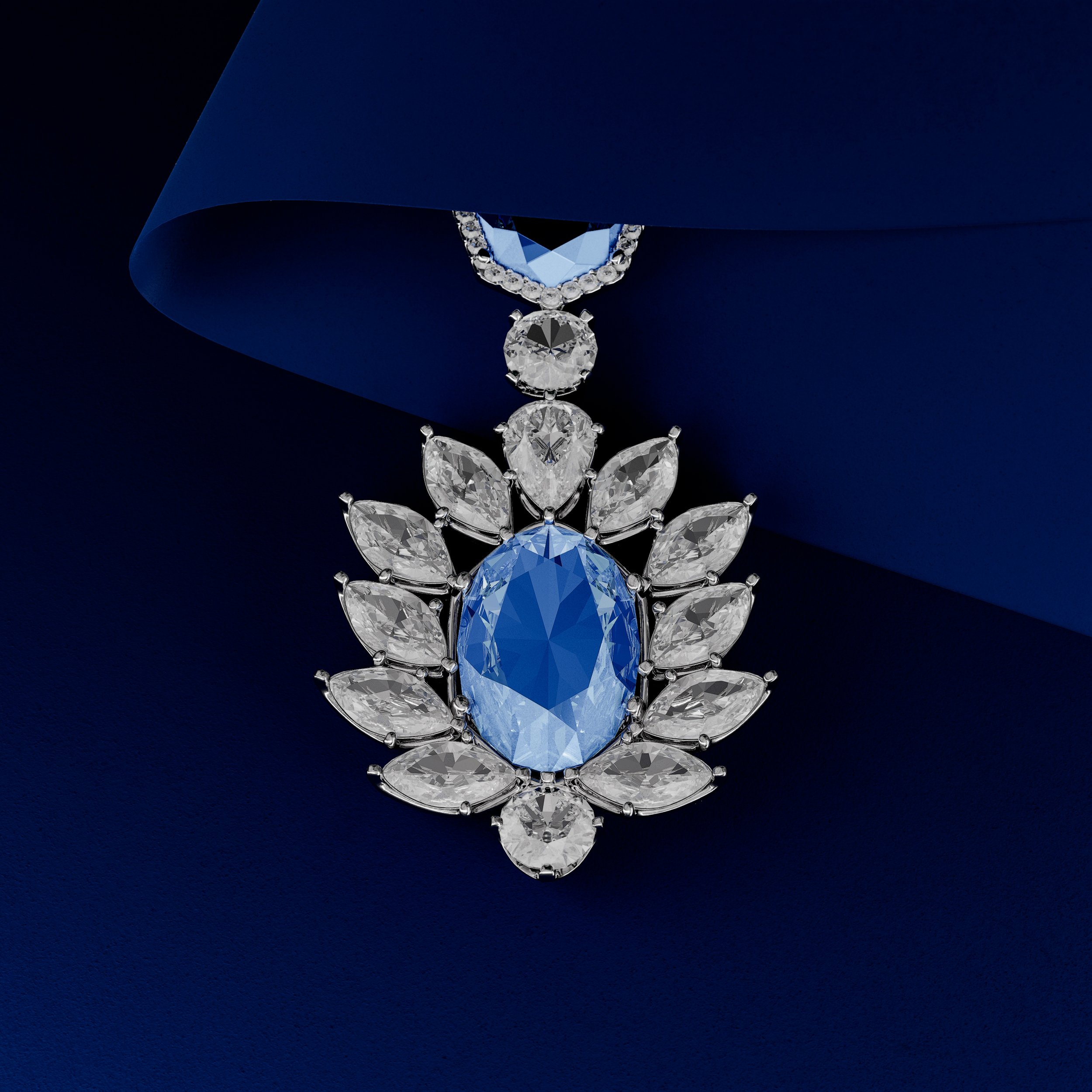 A close-up of a diamond and blue gemstone pendant necklace on deep blue background.