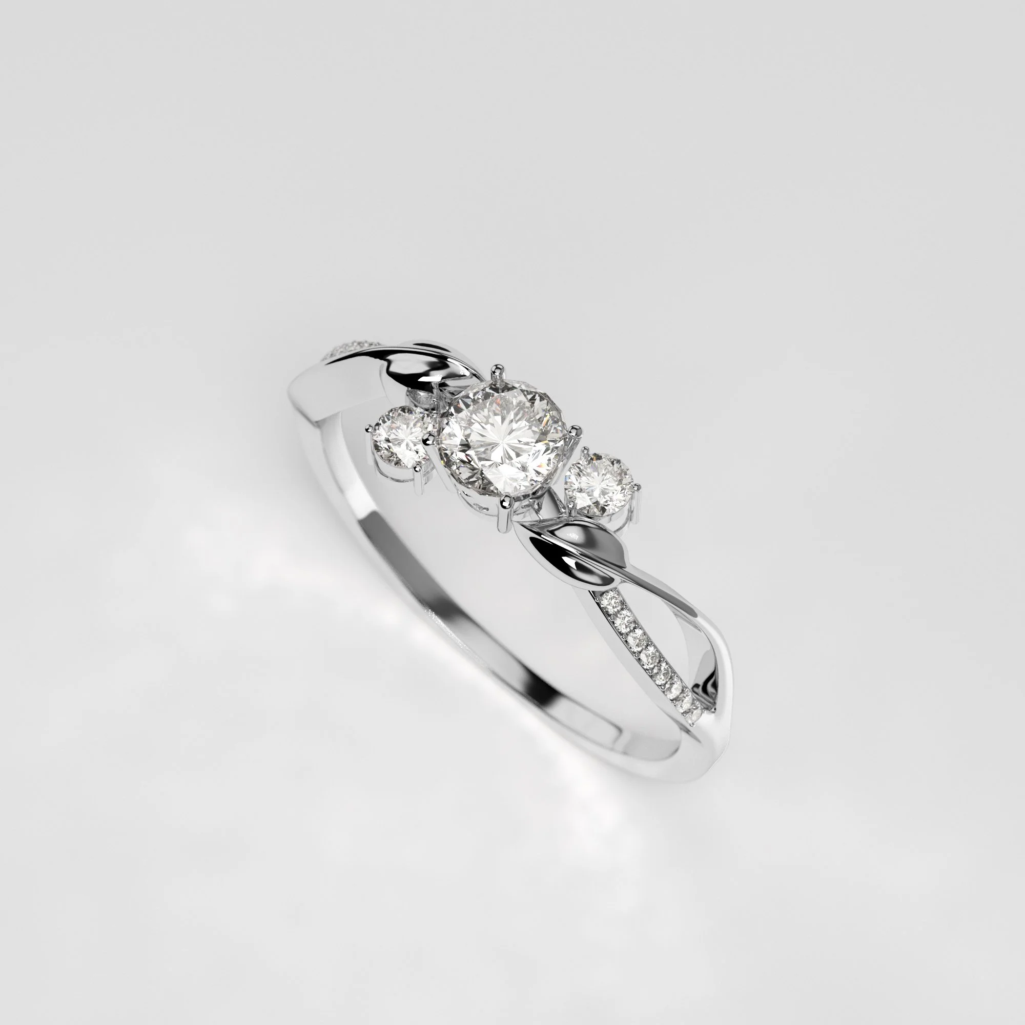 Silver ring with three large diamonds and smaller diamonds on the band, set against a white background.