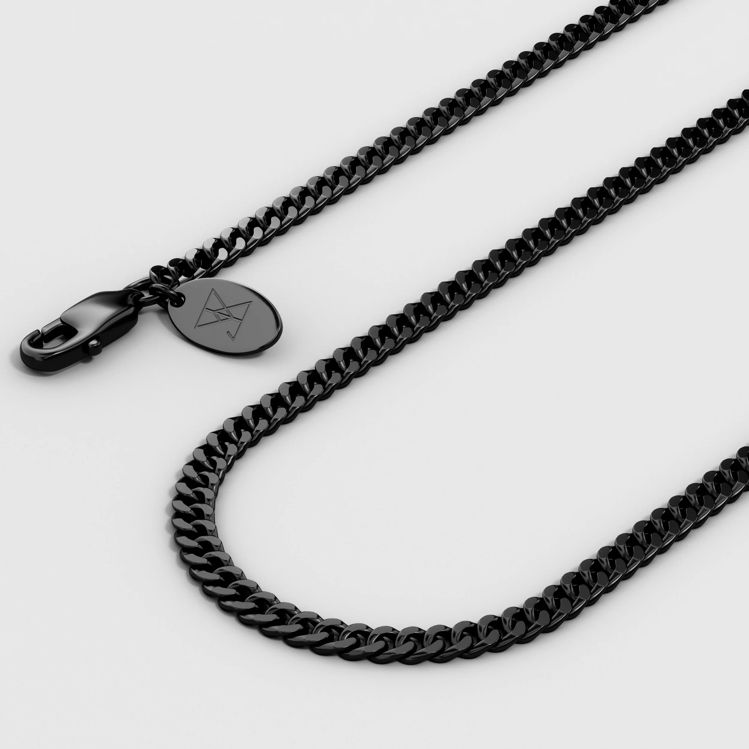 A black metal chain with a lobster clasp and a small oval tag, displayed on a white background.