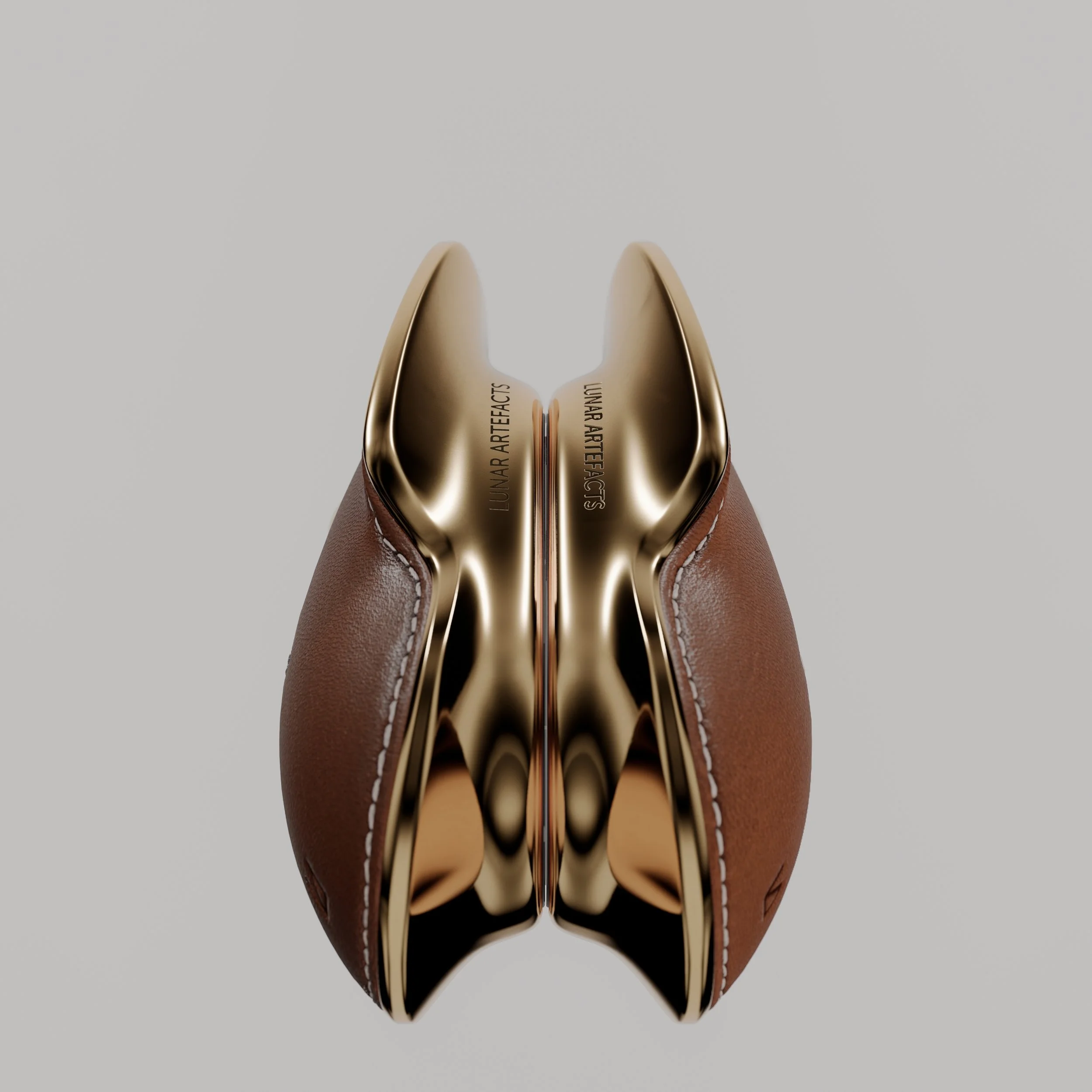 A pair of men's leather dress shoes with metallic soles, viewed from the top and slightly apart.