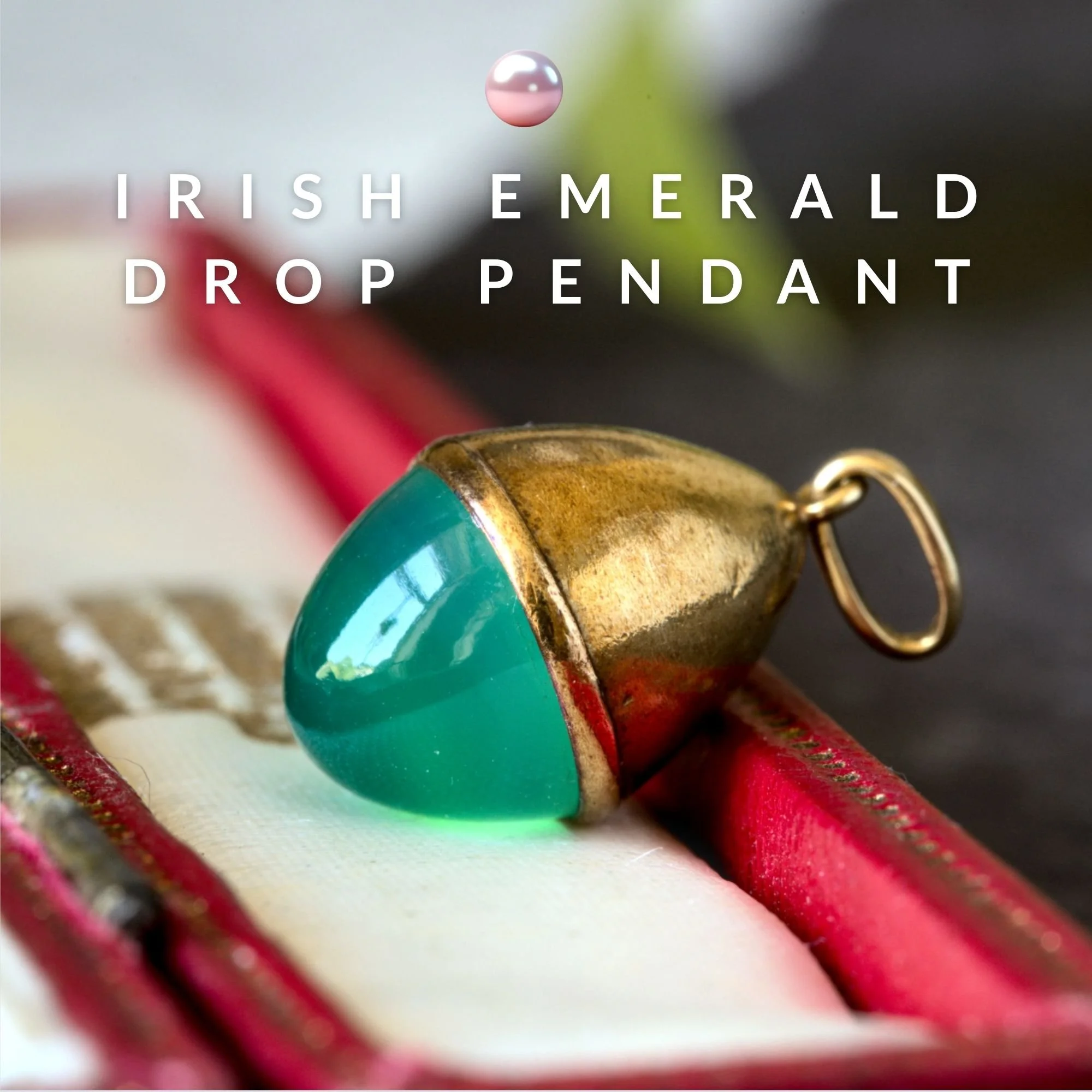 Emerald clover statement necklace in gold with green textured detailing and gemstone centre