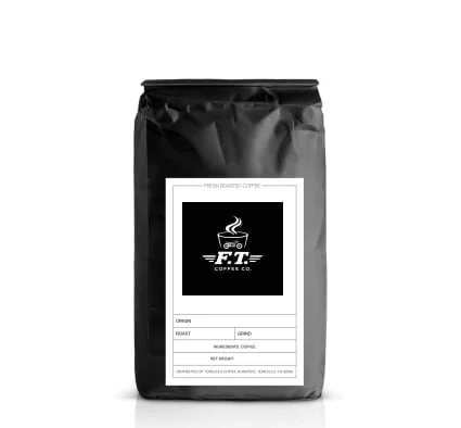 A black bag of coffee labeled 'Fitz Herbal Coffee' with a white label featuring a steaming cup logo.