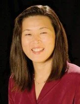 Smiling female physician, Dr. Guo