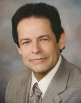 Smiling male physician, Dr. DeLeon