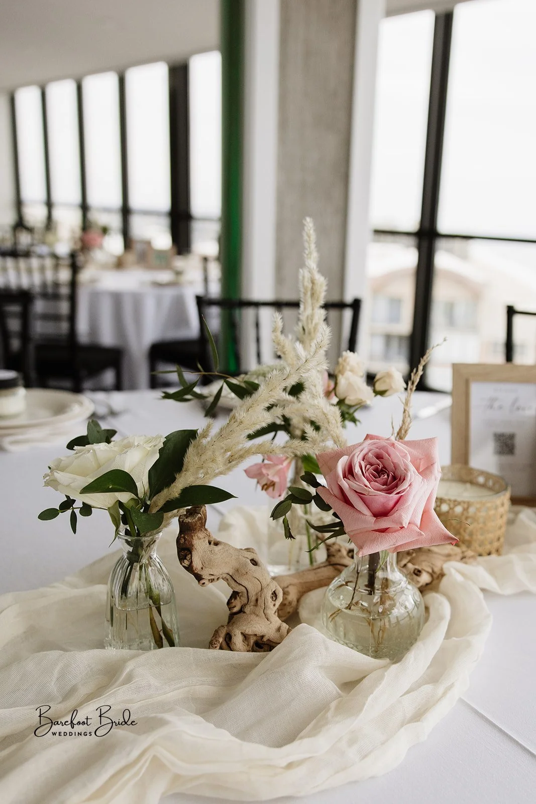 Boho Pampas and Pink Wedding Table Arrangments