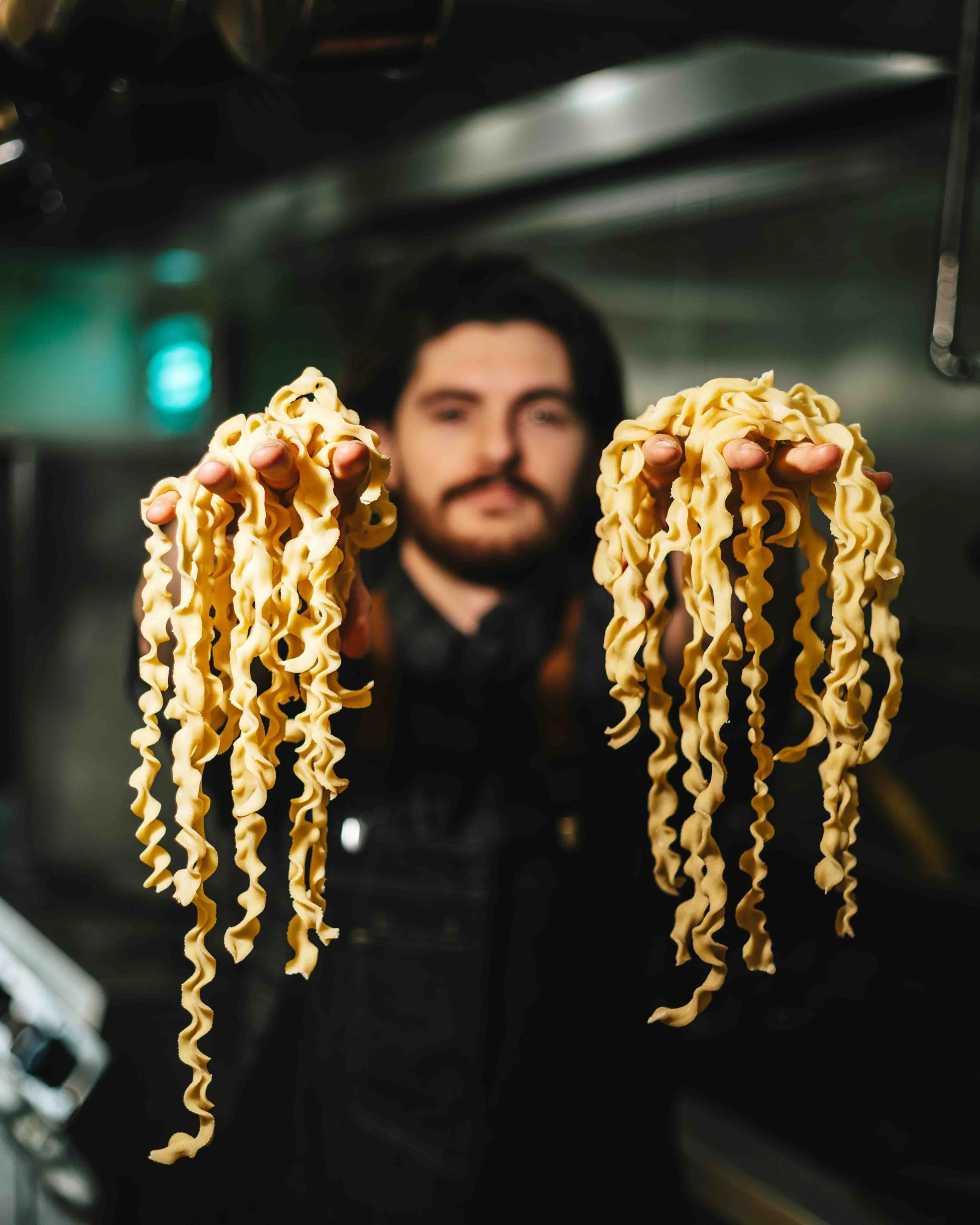 chef gabe cerrato holding fresh mafalda pasta