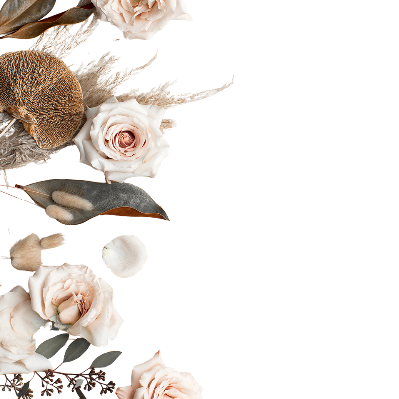 A floral arrangement with beige roses, a mushroom, feathers, cotton flowers, and eucalyptus leaves.