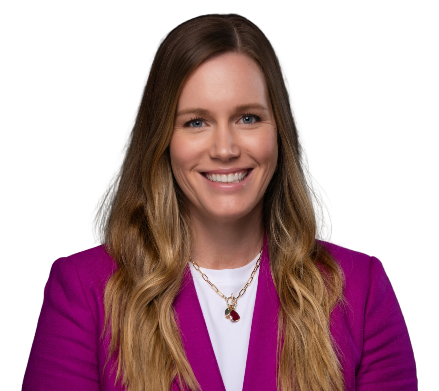 A woman with long wavy blonde hair wearing a purple blazer and smiling, white background.