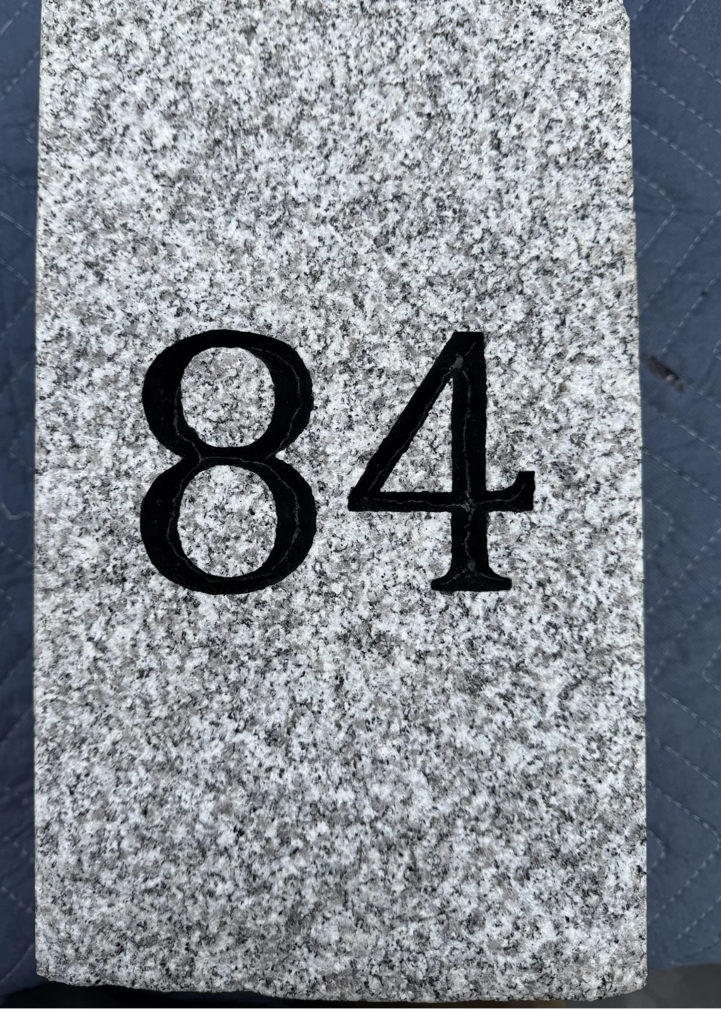 close-up of standard style number engraving number 84