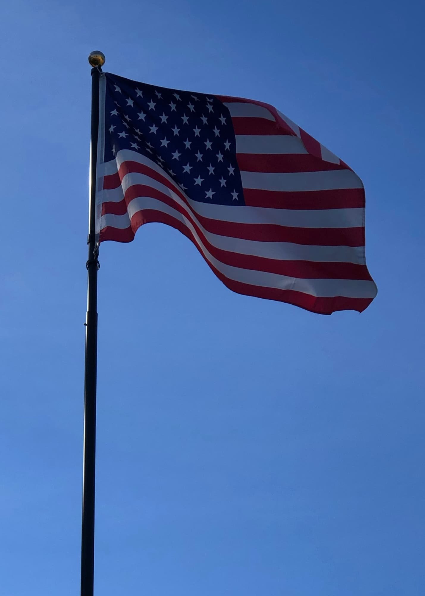 American flag flying on a flag pole