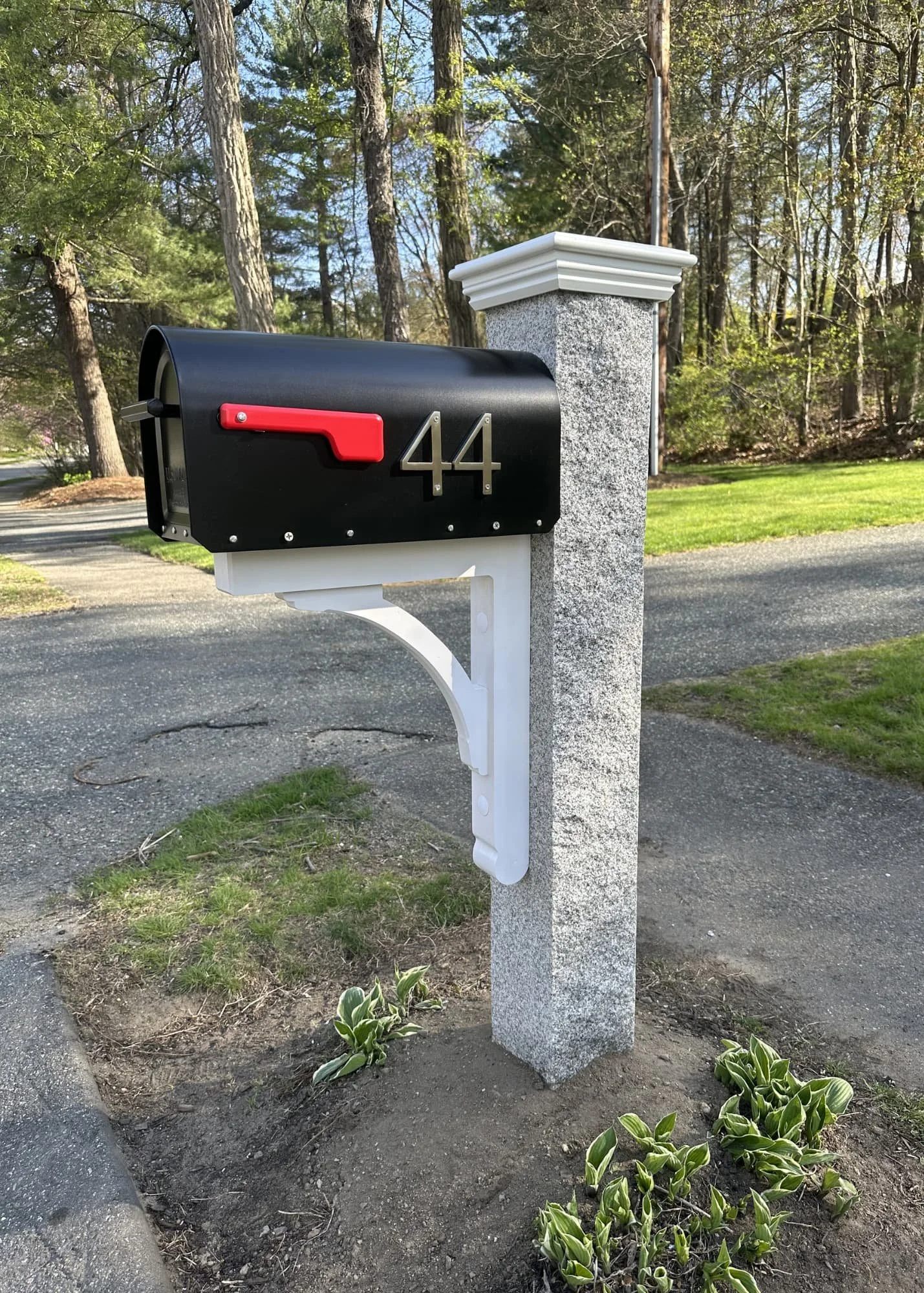 granite post, white AZEK cap, black mailbox, white AZEK bracket