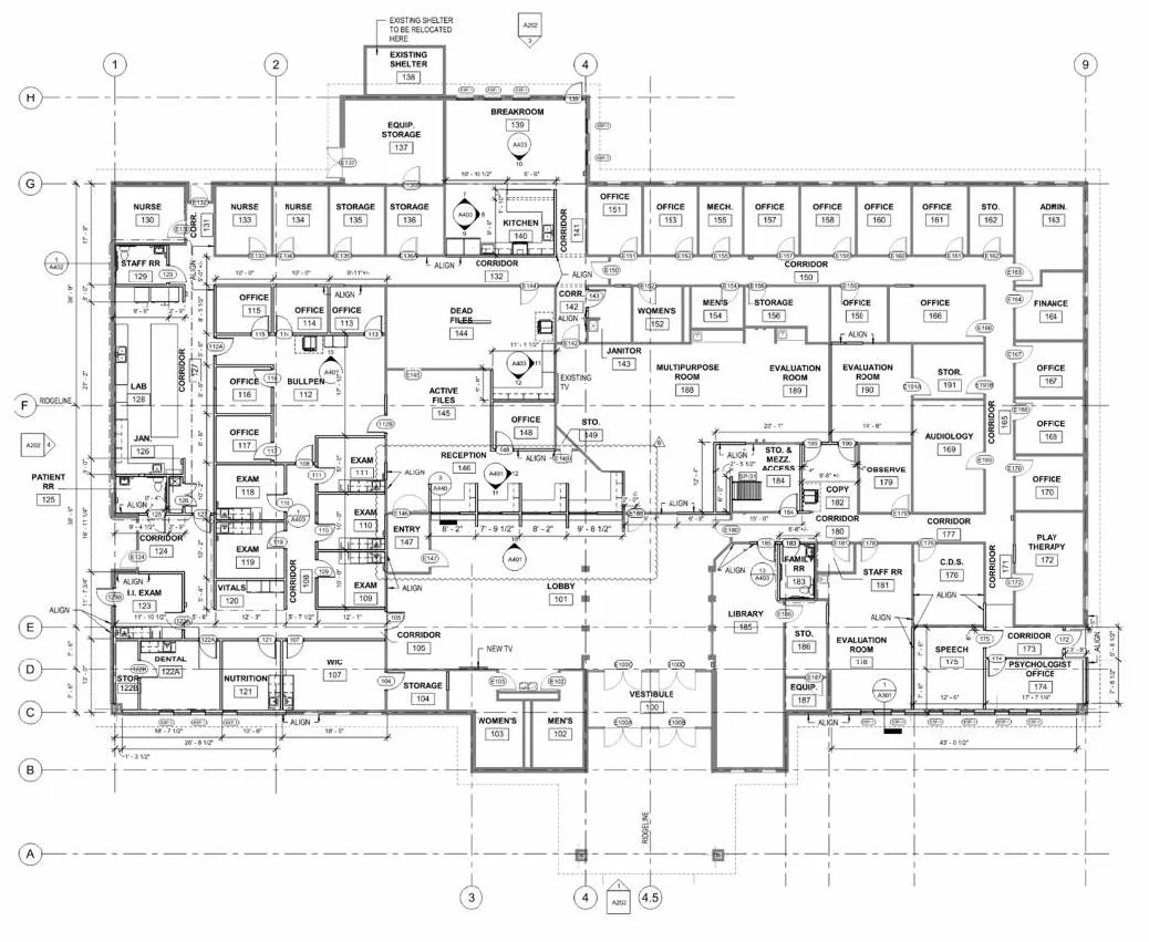 Detailed floor plan of a healthcare facility, including rooms labeled for various medical and administrative functions such as nurses' stations, storage, offices, examination rooms, therapy rooms, and support areas.