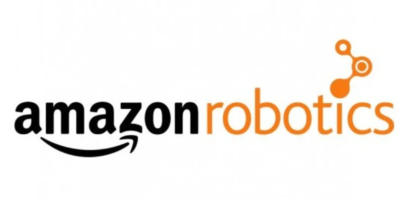Amazon Robotics logo featuring the word 'amazon' in black with a yellow arrow and 'robotics' in orange, with an abstract orange robot icon above.