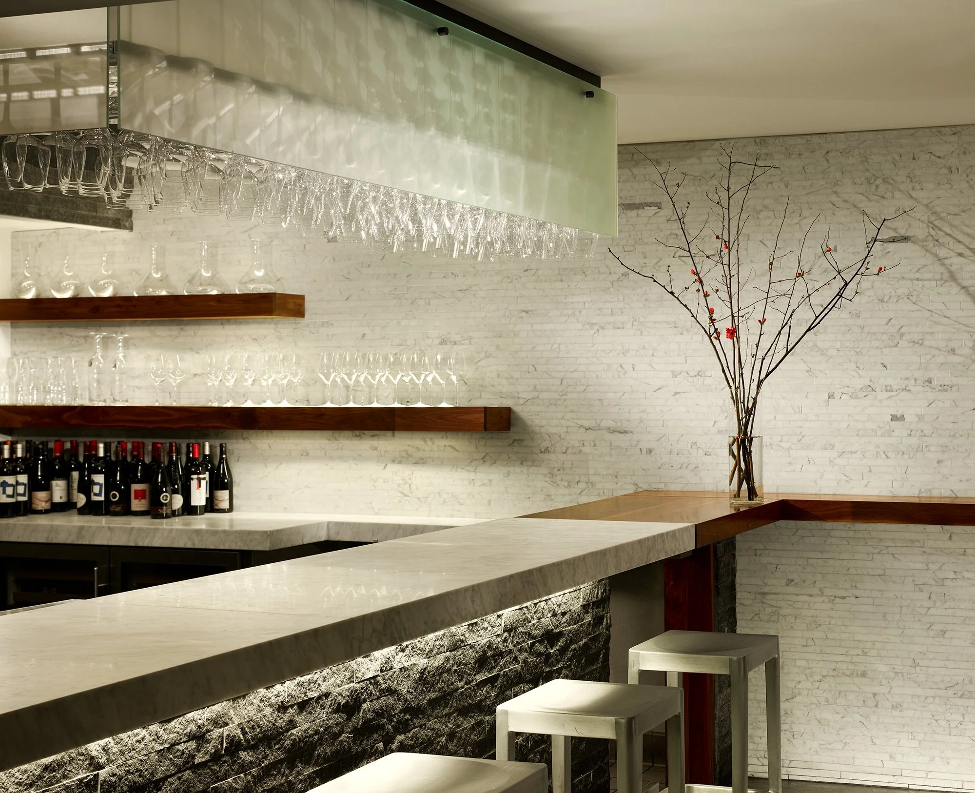 Local Wine Merchant restaurant and bar in San Francisco. Everything custom fabricated. Modern kitchen and bar area with white marble countertops.