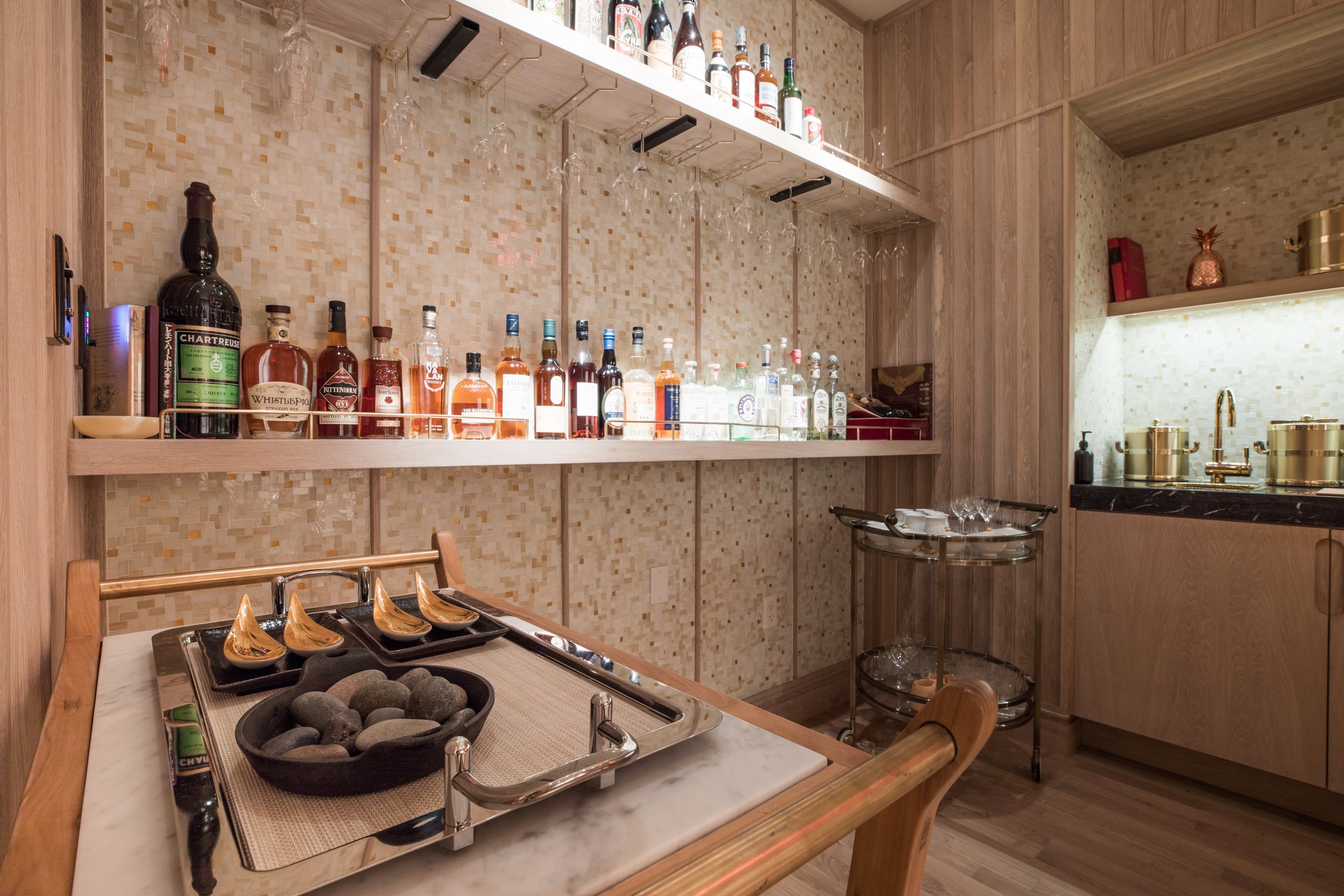 Eight Tables restaurant above China Live Market in San Francisco, California. A kitchen and bar area.