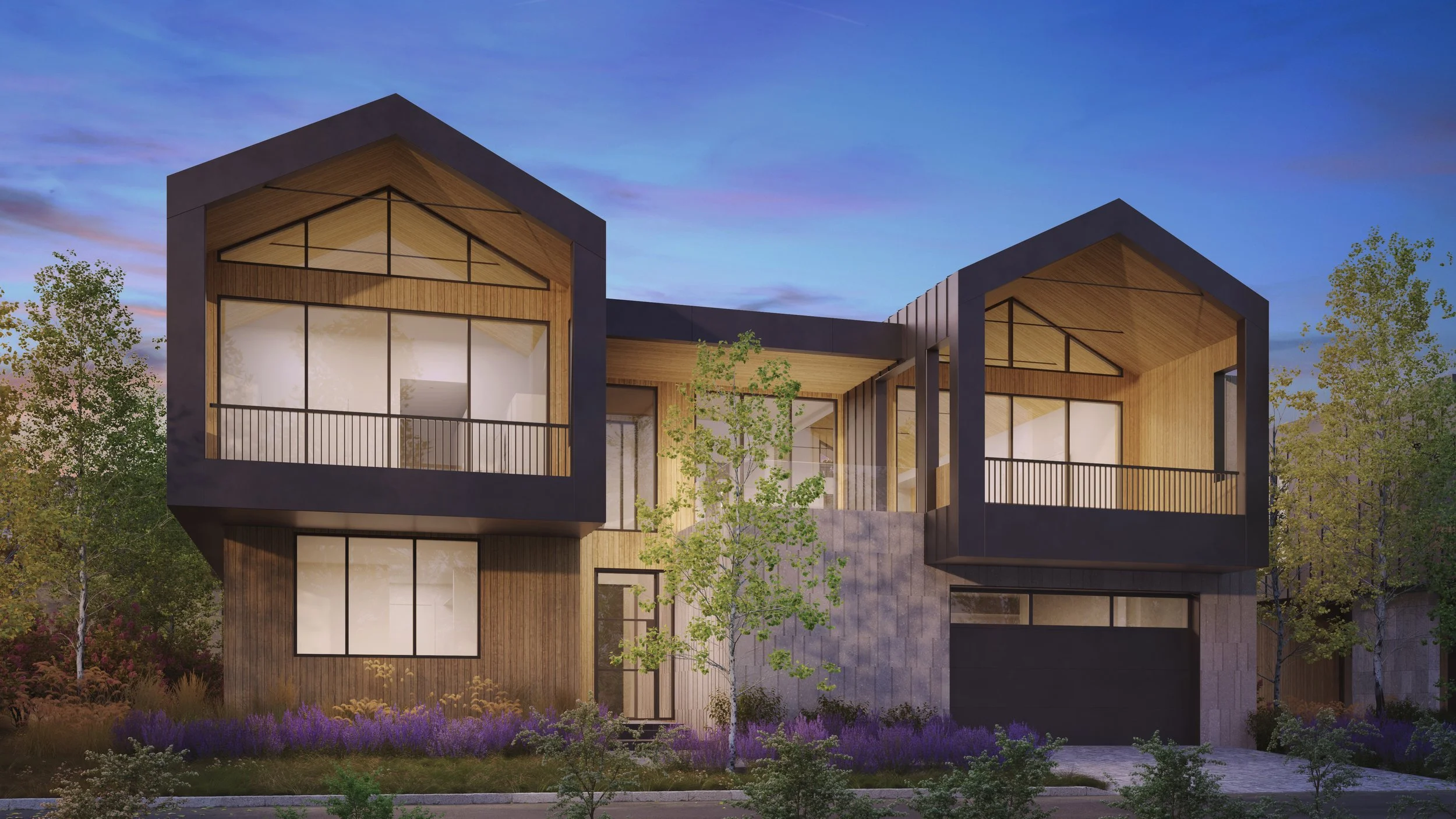 Jackson Development in Jackson, Wyoming. Modern multi-story residential building with large glass windows, wooden accents, and balconies, surrounded by trees and landscaping, taken during dusk.