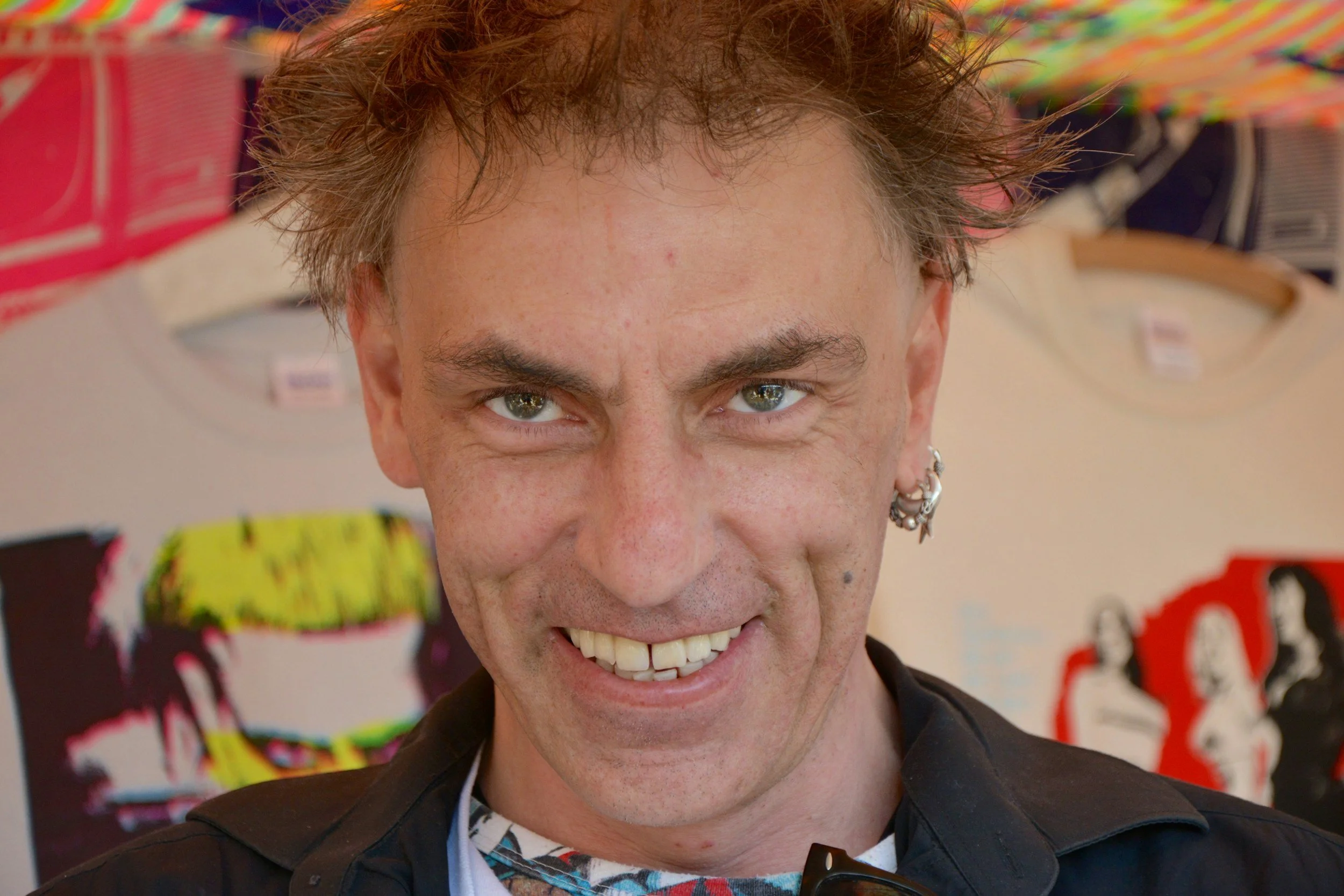 Man smiling with very punchable grin