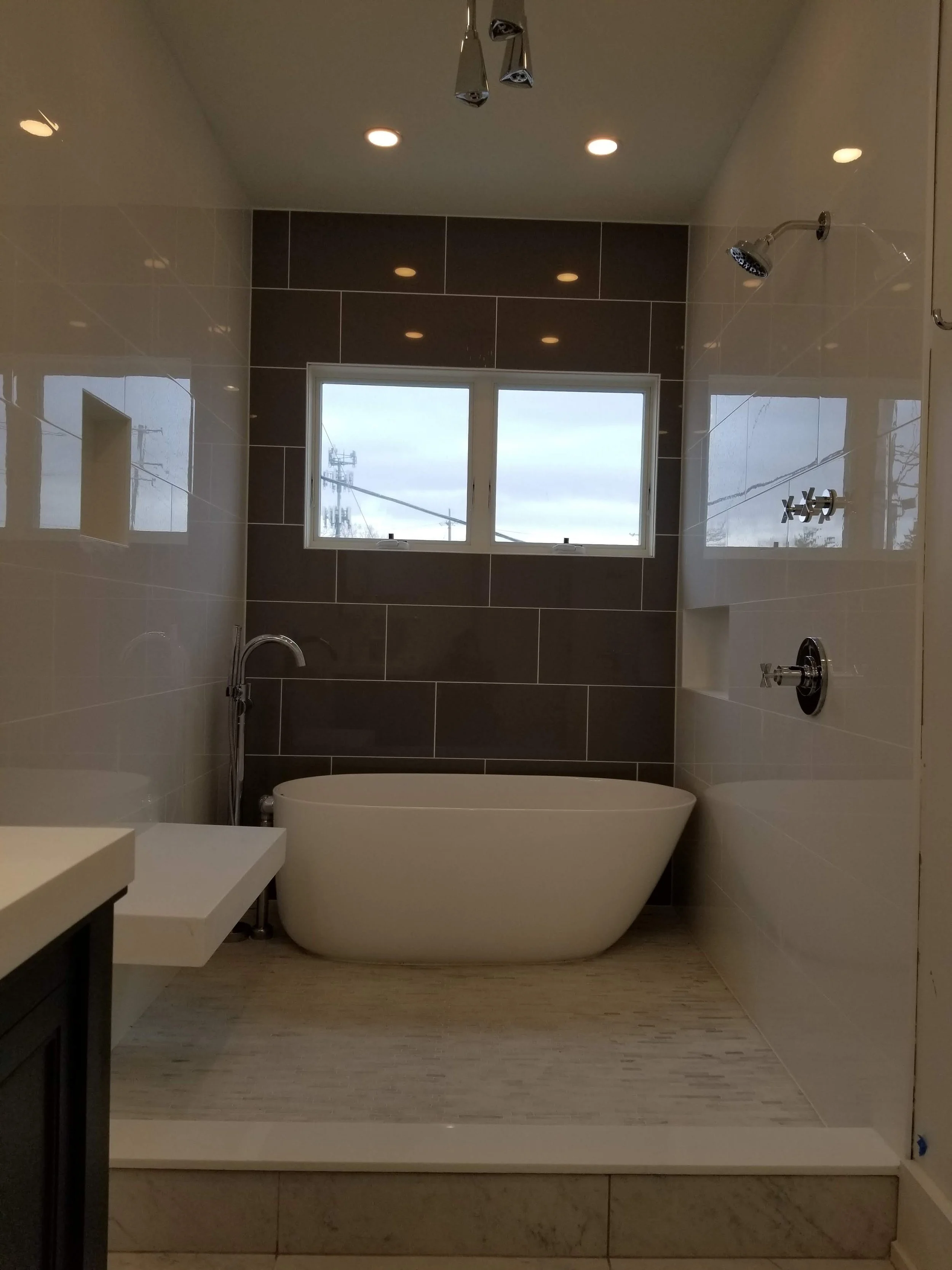 Custom Spa Bathroom with Integrated Tub and Shower