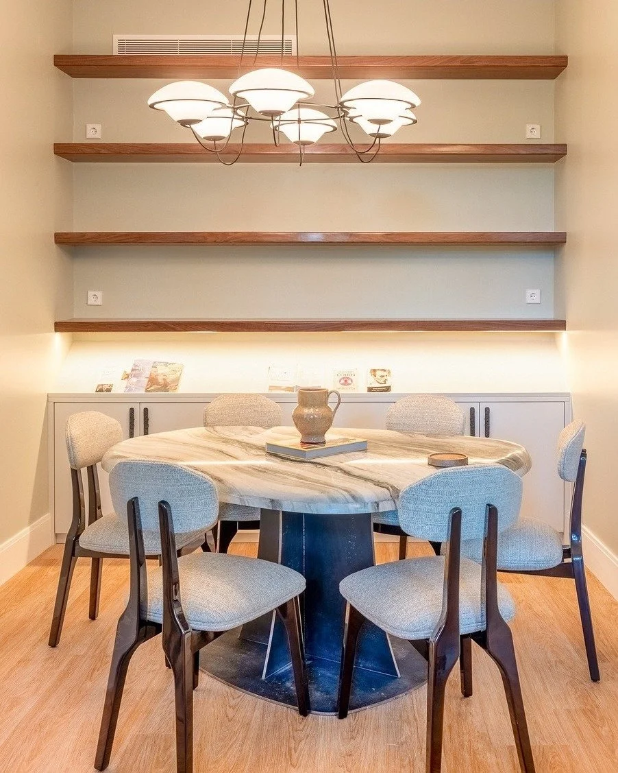 A refined dining space centered around a unique marble table, designed to be both a statement piece and a place to gather.

The dining area connects effortlessly with the living and TV lounge, creating a beautifully integrated environment where each 