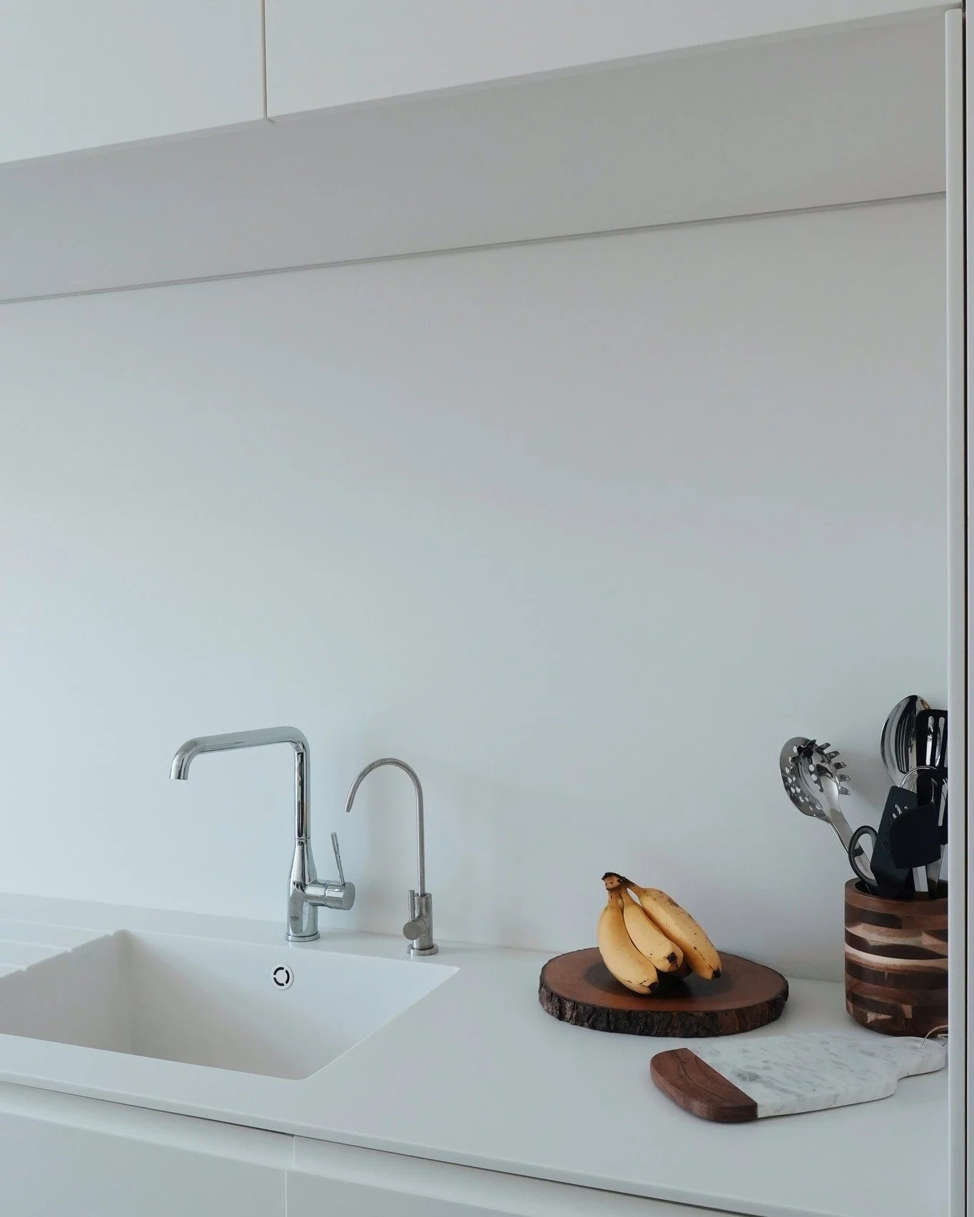 How many stories can a kitchen hold?

The scent of a cake just out of the oven.
Laughter echoing over a shared meal.
The quiet ritual of a morning coffee, still warm in your hands.

A thoughtfully designed kitchen considers light, flow, and materials