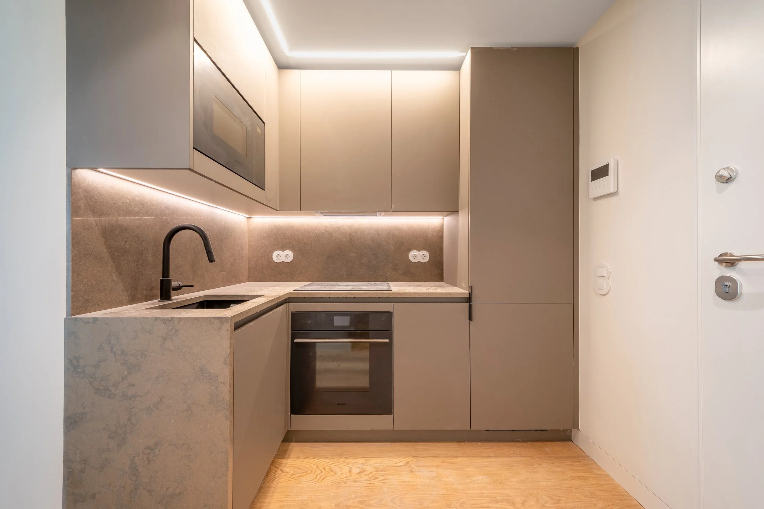Contemporary kitchen with warm lighting
