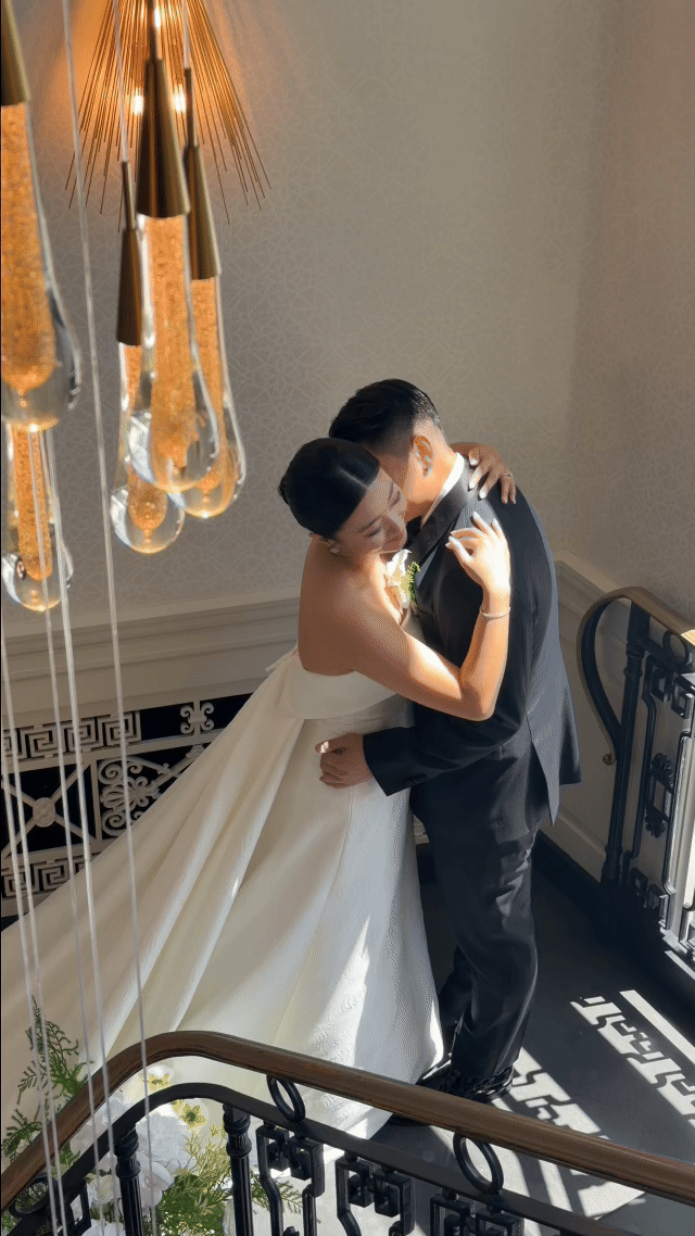 the-lannin-wedding-couple-staircase.gif