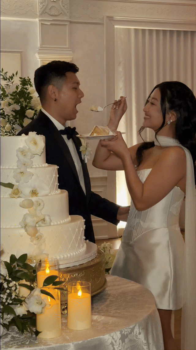 the-lannin-wedding-couple-cake-cutting.gif