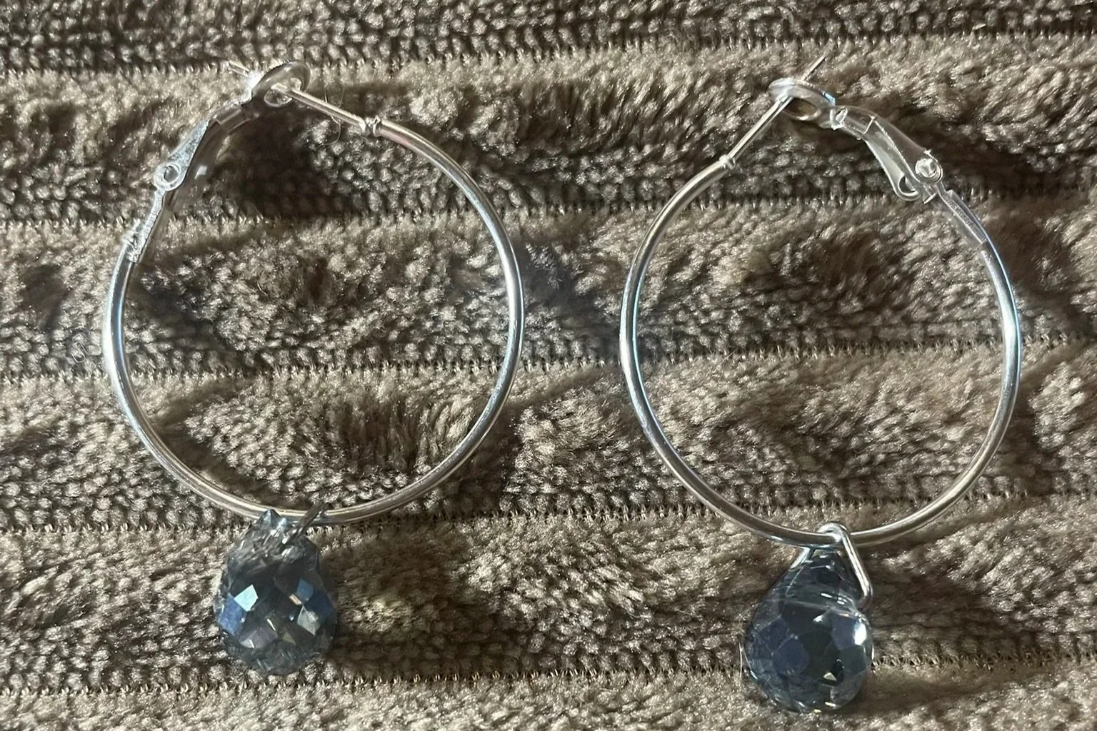 Earrings-Hoops - 30mm wide, Silver color, Teardrop lt. blue color hanging crystal