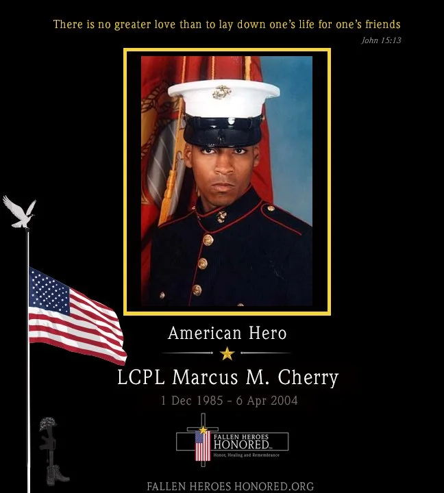 Memorial plaque honoring LCPL Marcus M. Cherry, an American hero. Features a portrait of him in military uniform, with a quote from John 15:13 at the top, a U.S. flag image, and the Fallen Heroes Honored logo at the bottom.