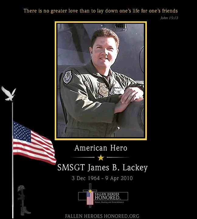 Image of a memorial honoring SMSGT James B. Lackey, an American hero, with his photo, name, rank, birth and death dates, and patriotic and memorial symbols, including an American flag, a dove, and a flag with a cross.