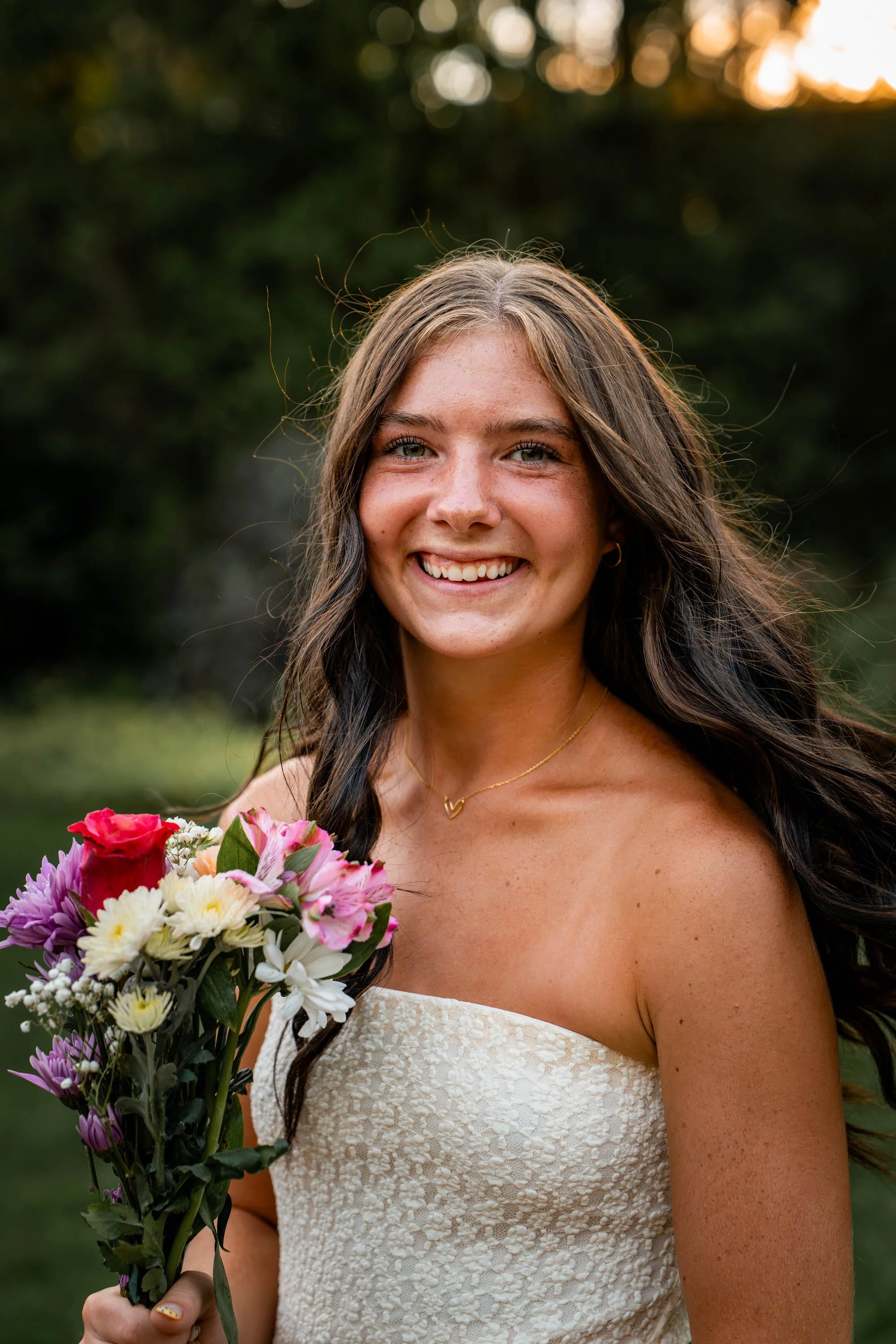 a girl holds flowers