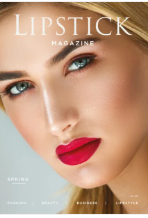 Close-up of a woman with blonde hair, blue eyes, and red lipstick on the cover of Lipstick Magazine Spring issue.