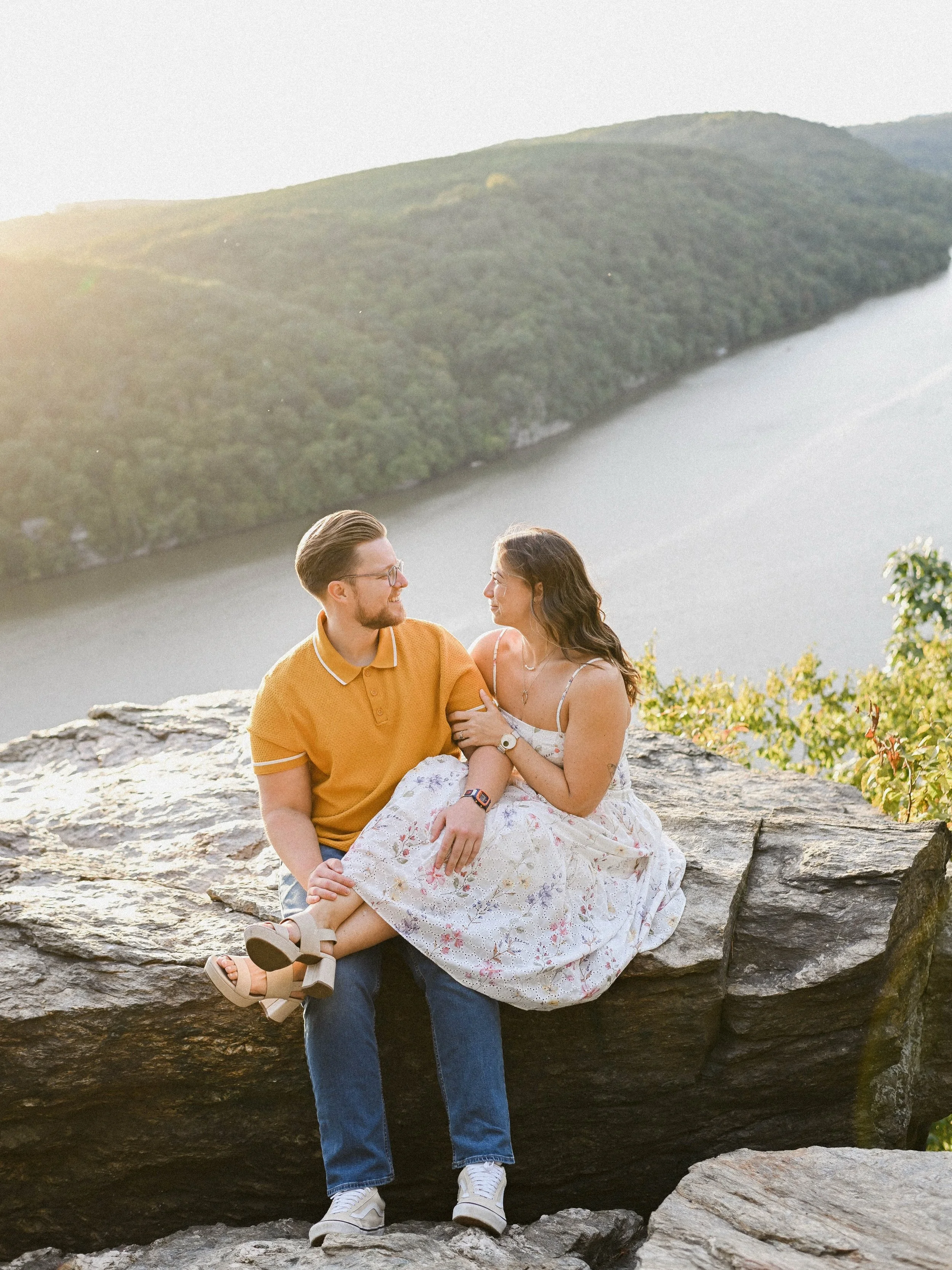 My favorite thing about Logan &amp; Dani&rsquo;s engagement session was, *checks notes* everything. From the city to grabbing a coffee to winding up in a game store and then bouldering at a stunning overlook, every part of their engagement session sc